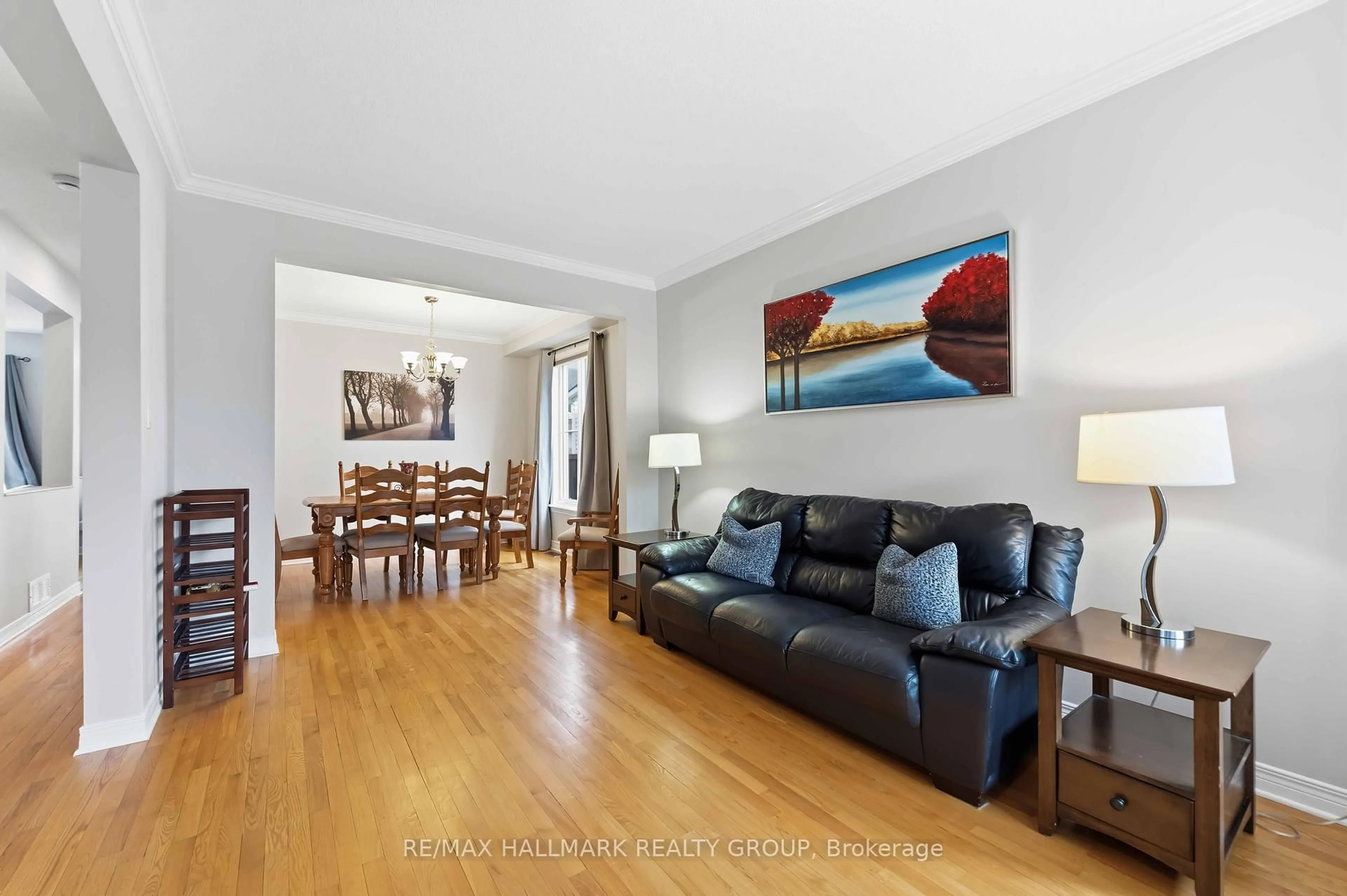 Living room with furniture, wood/laminate floor for 22 Oak Grove St, Ottawa Ontario K2G 6R4