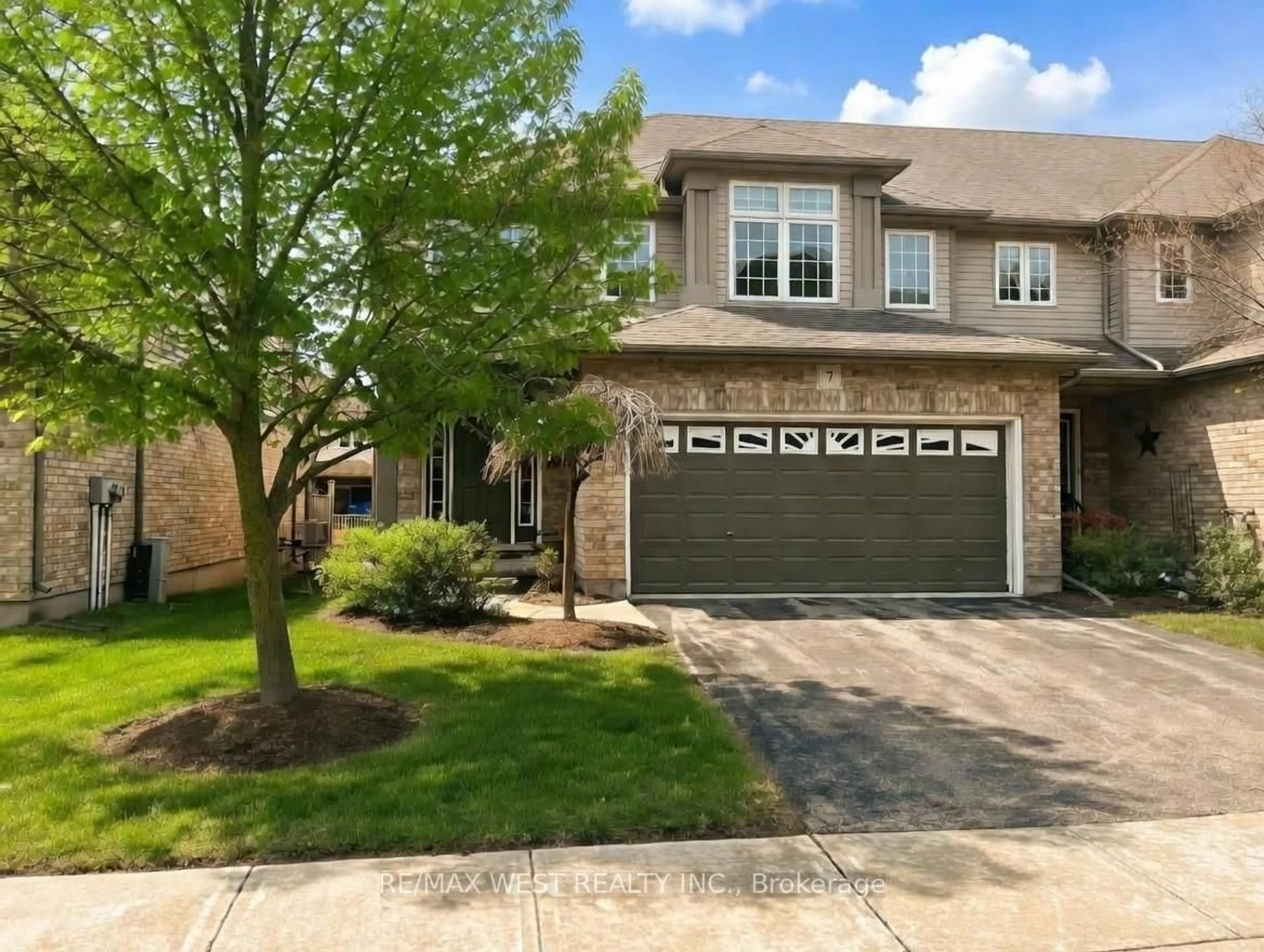 Home with brick exterior material, street for 255 Summerfield Dr #7, Guelph Ontario N1L 0E1