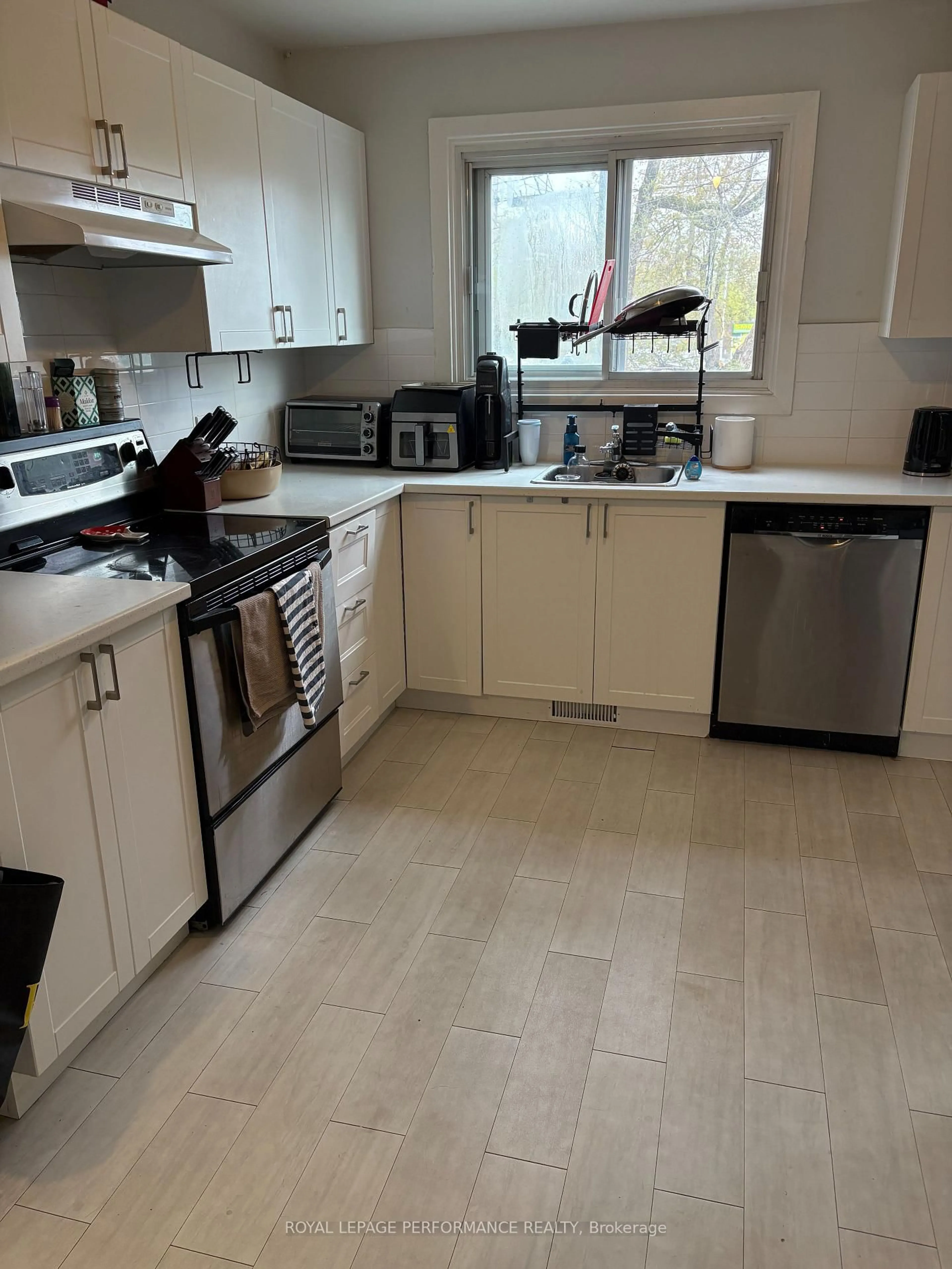 Open concept kitchen, ceramic/tile floor for 1779 Kerr Ave, Ottawa Ontario K2A 1H9