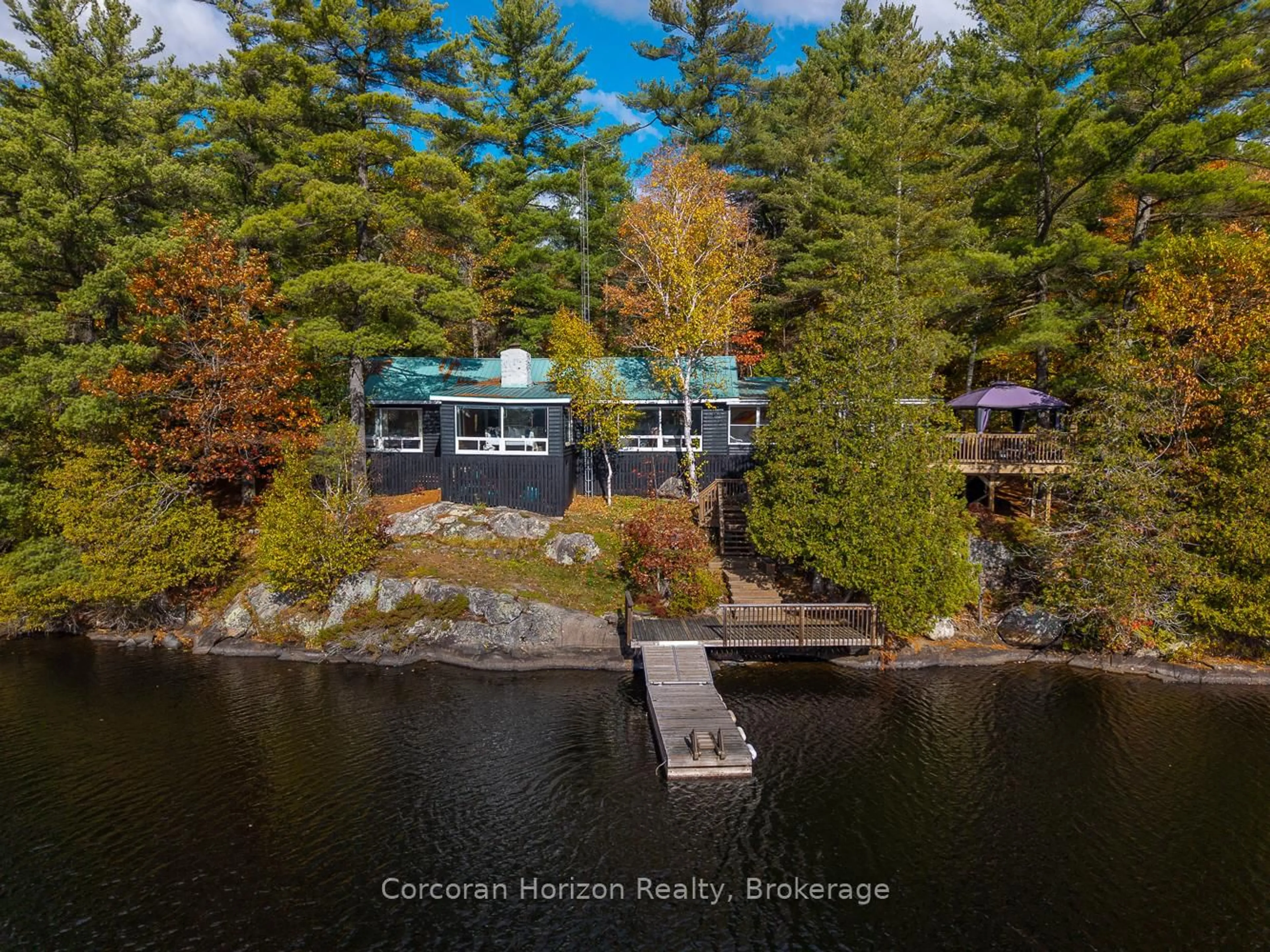 A pic from outside/outdoor area/front of a property/back of a property/a pic from drone, water/lake/river/ocean view for 26 Sharon Park Dr, McKellar Ontario P0G 1C0