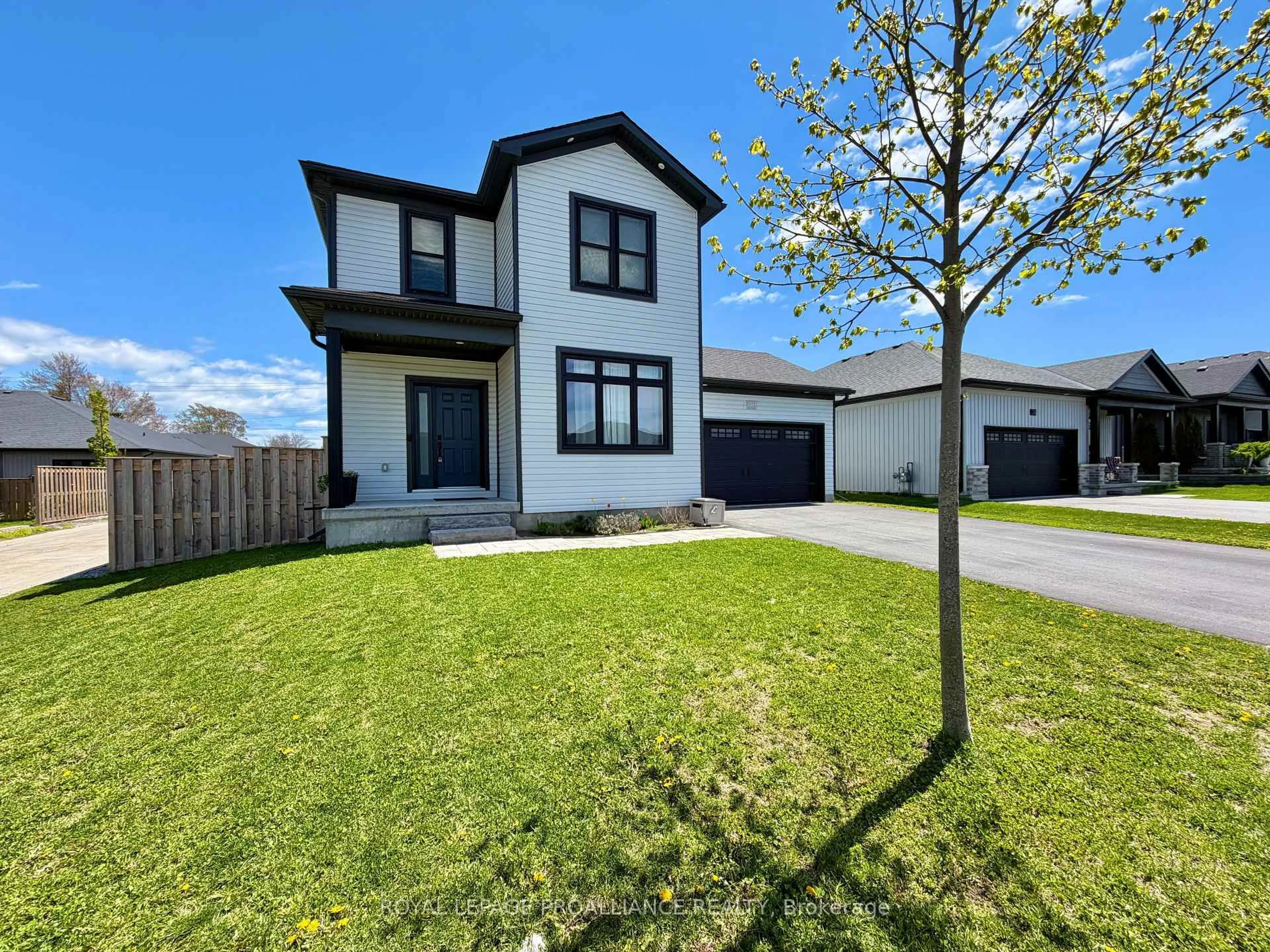 A pic from outside/outdoor area/front of a property/back of a property/a pic from drone, street for 26 Curtis St, Prince Edward County Ontario K0K 2T0