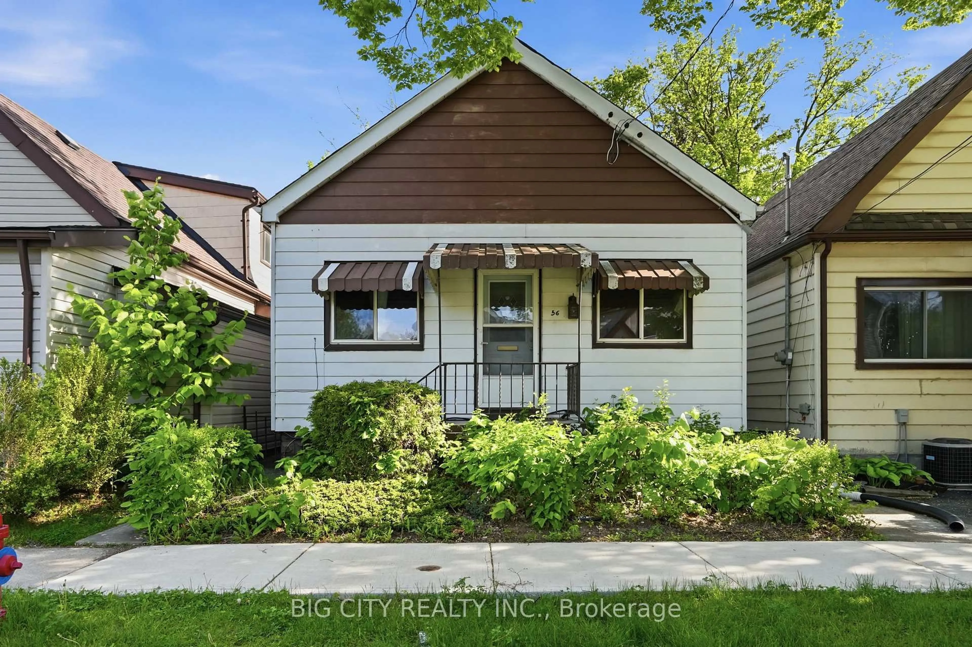 Home with vinyl exterior material, street for 56 Holmes Ave, Hamilton Ontario L8S 2K6
