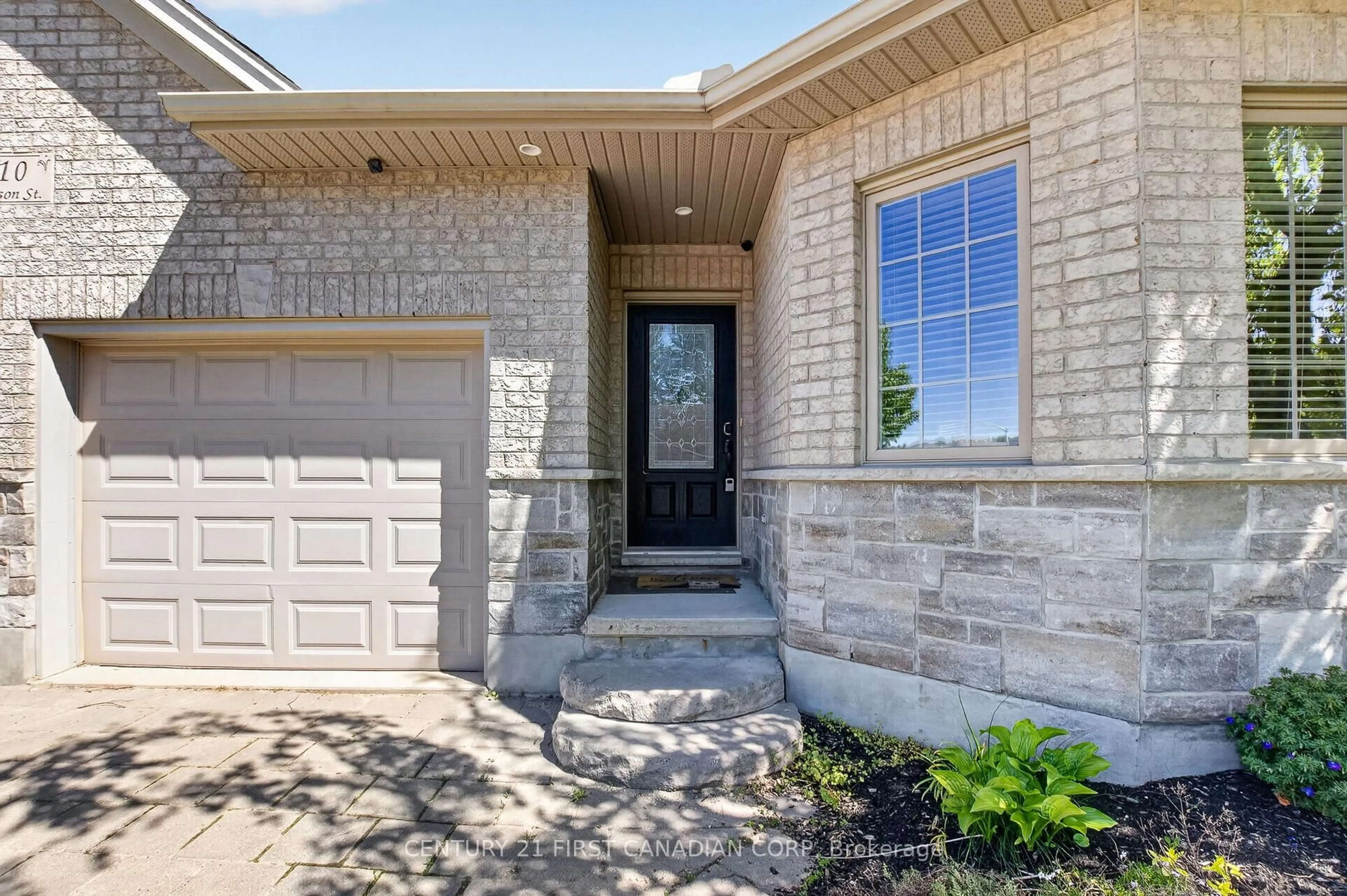 Home with brick exterior material, street for 110 Watson St, Lucan Biddulph Ontario N0M 2J0