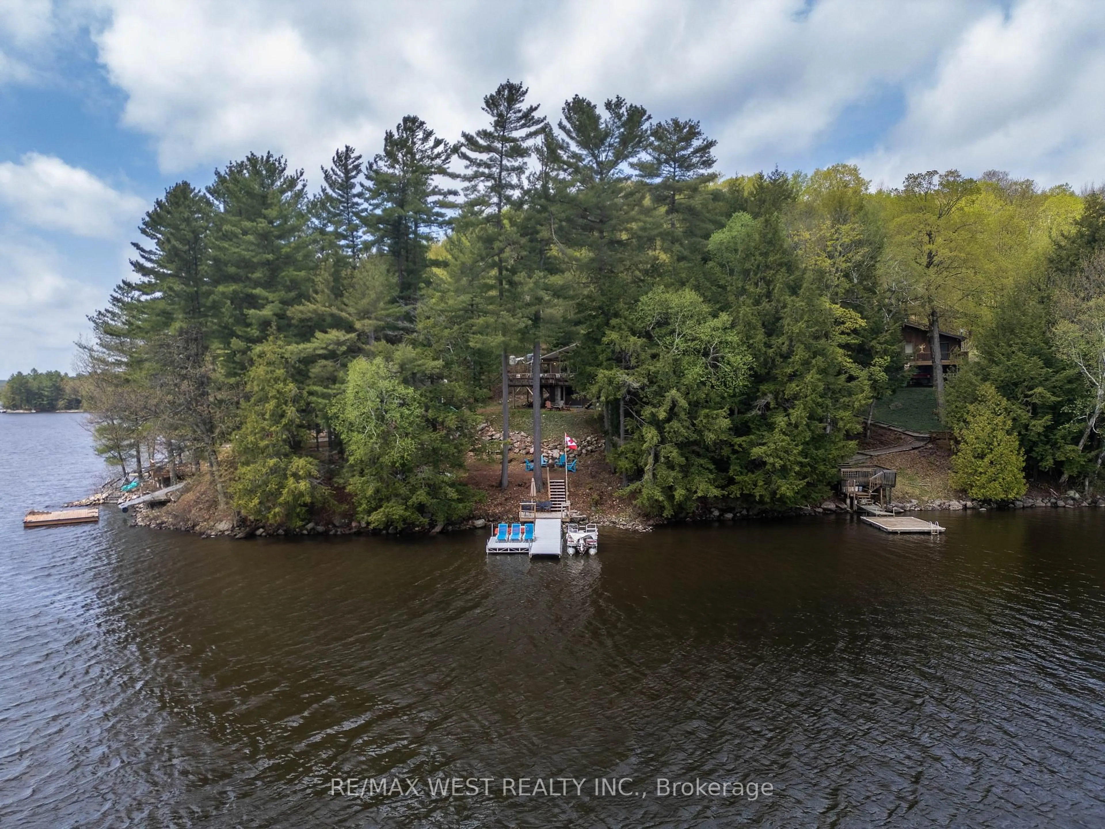 A pic from outside/outdoor area/front of a property/back of a property/a pic from drone, water/lake/river/ocean view for 1075 Carlo Enterprise Rd #19, Muskoka Lakes Ontario P0B 1M0