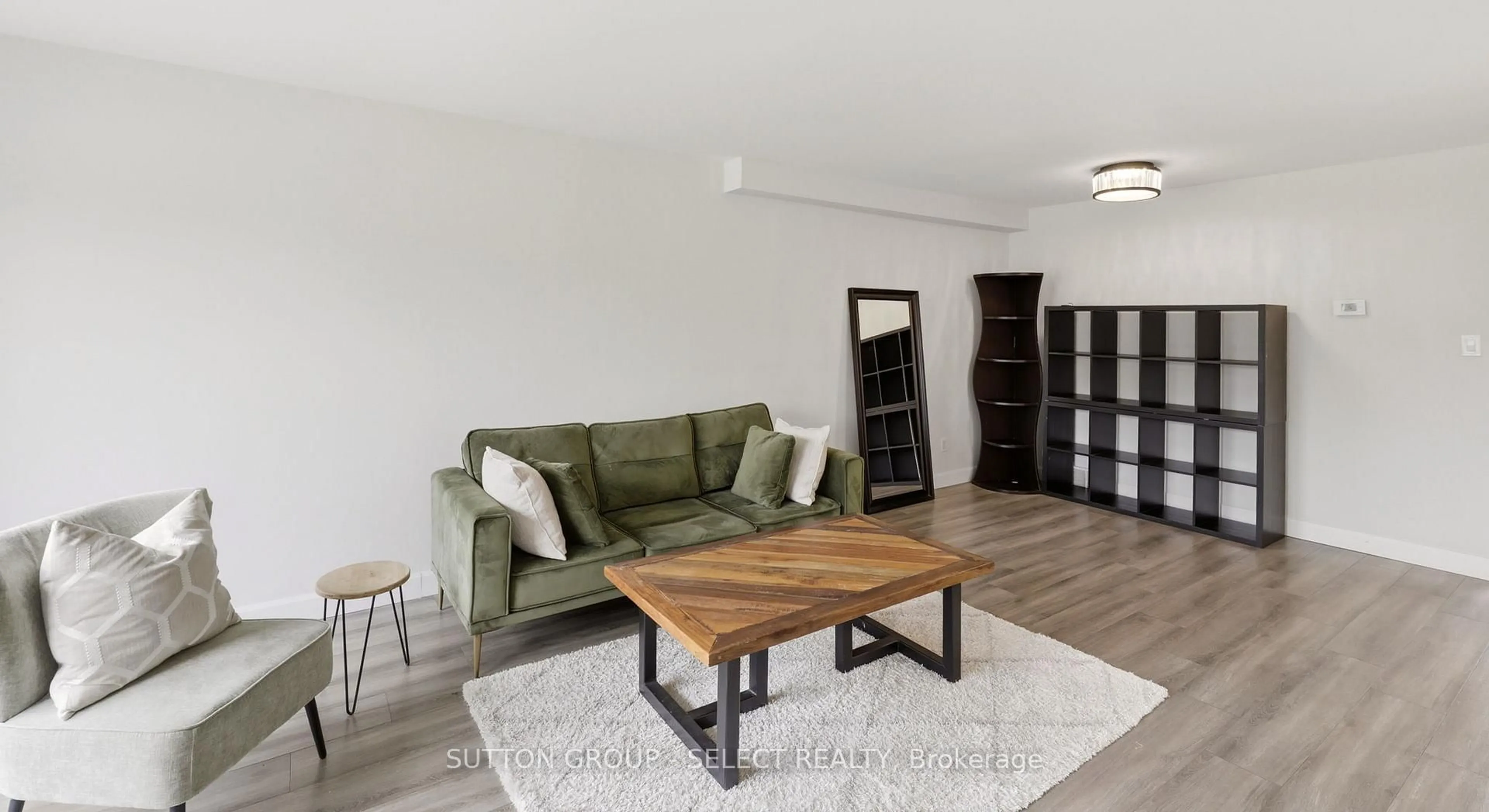 Living room with furniture, wood/laminate floor for 51 Sholto Dr #24, London South Ontario N6E 2H9