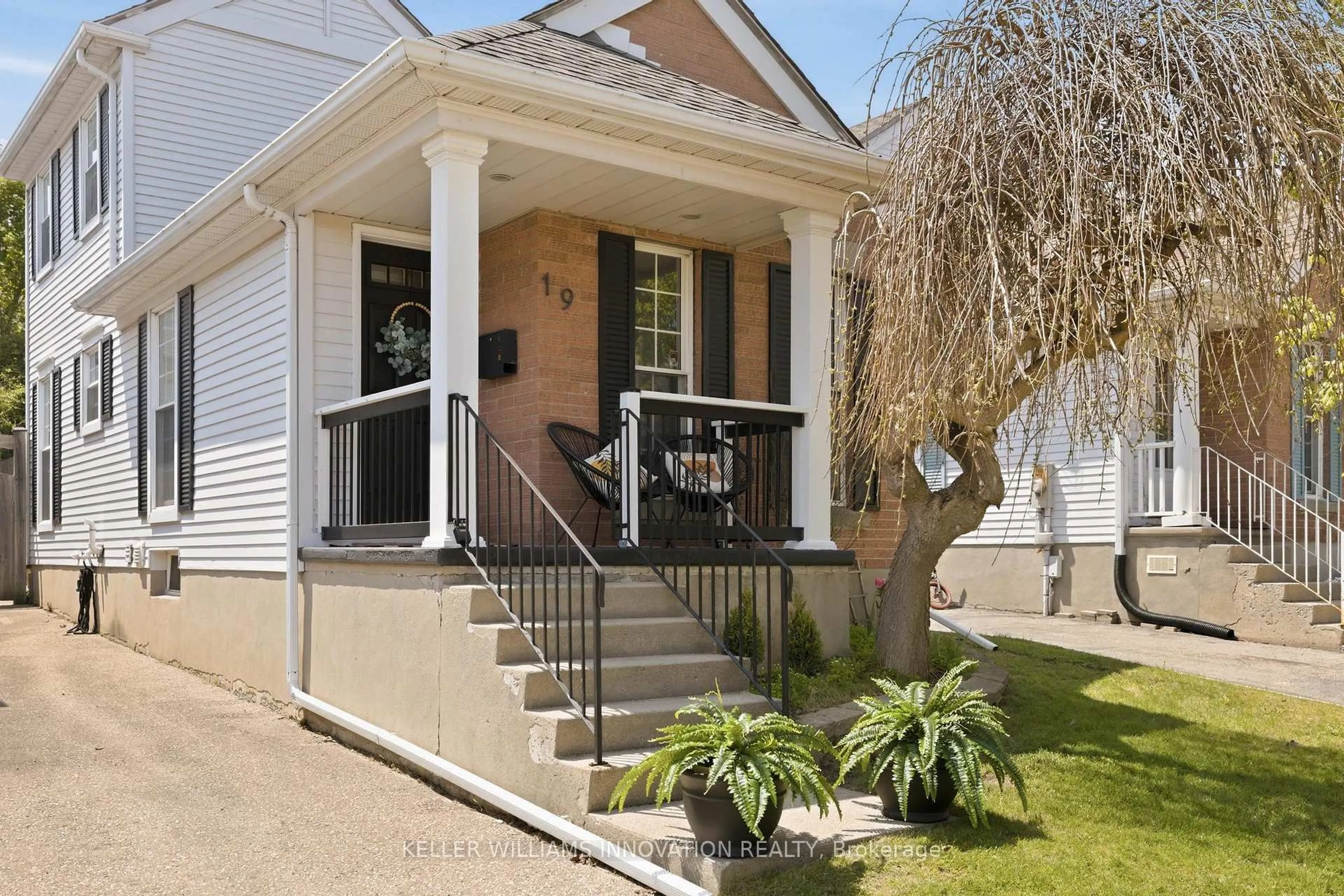 Home with vinyl exterior material, street for 19 Milfoil Cres, Kitchener Ontario N2E 3L2