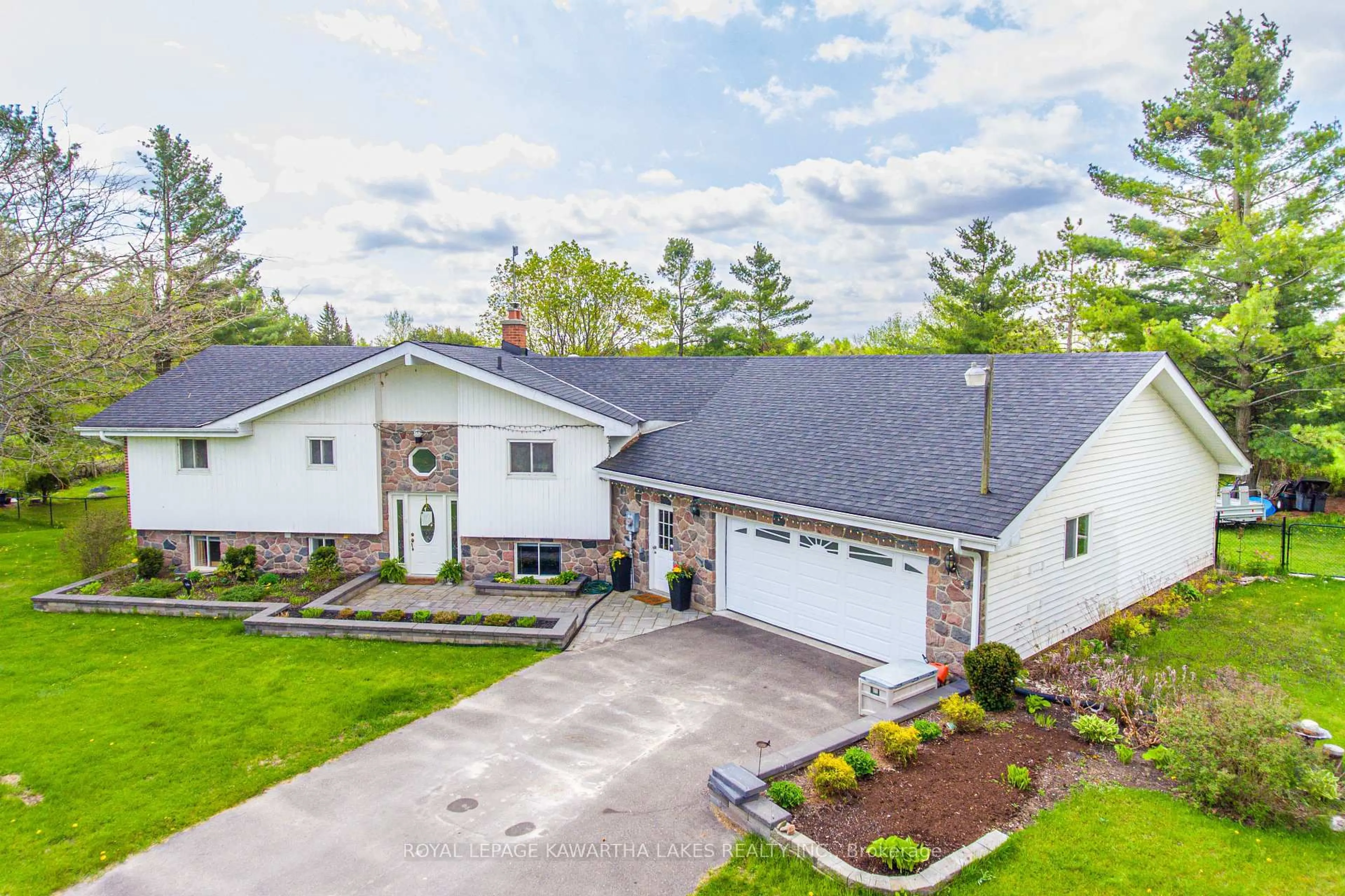 A pic from outside/outdoor area/front of a property/back of a property/a pic from drone, unknown for 1032 Zion Rd, Kawartha Lakes Ontario K0M 2C0