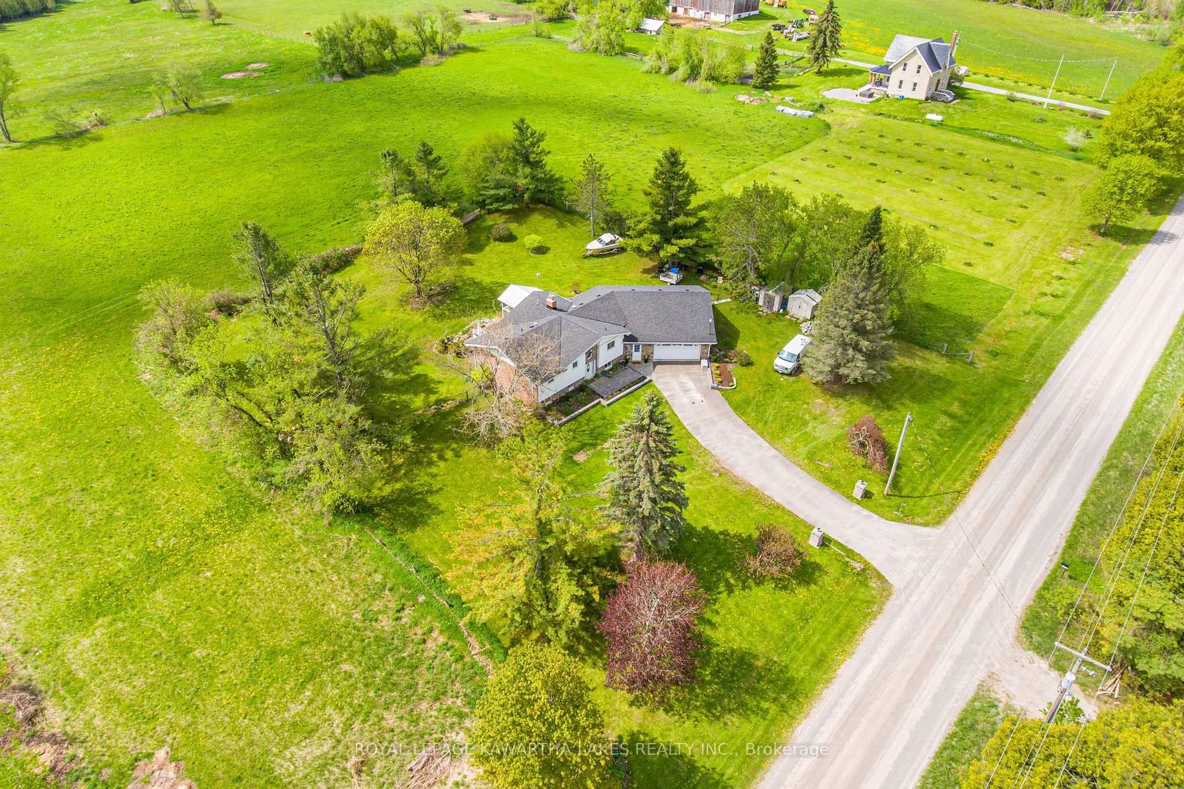 A pic from outside/outdoor area/front of a property/back of a property/a pic from drone, street for 1032 Zion Rd, Kawartha Lakes Ontario K0M 2C0