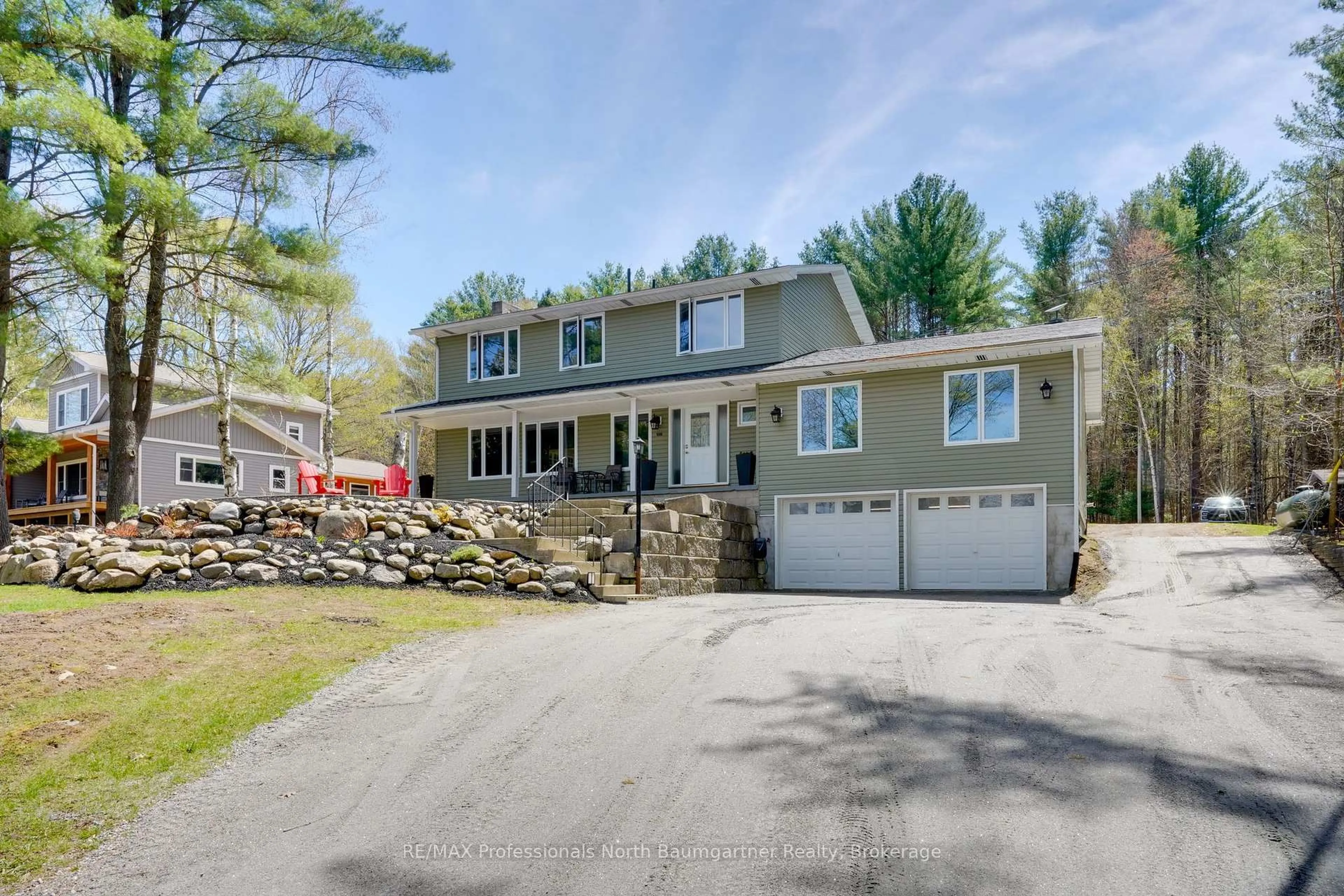 Home with vinyl exterior material, street for 1506 Kashagawigamog Lake Rd, Minden Hills Ontario K0M 2K0