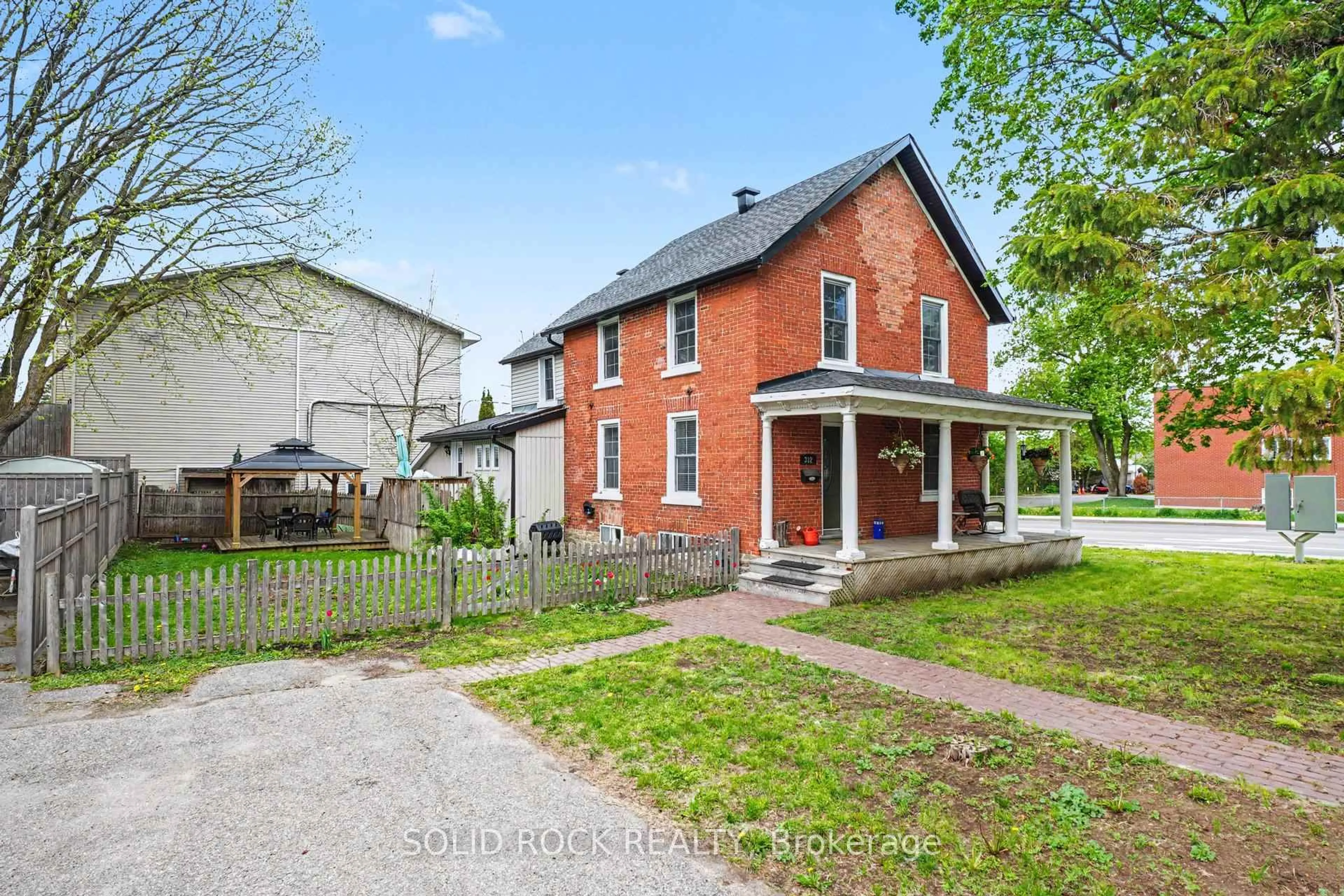 Home with brick exterior material, street for 312 Bridge St, Carleton Place Ontario K7C 3H8
