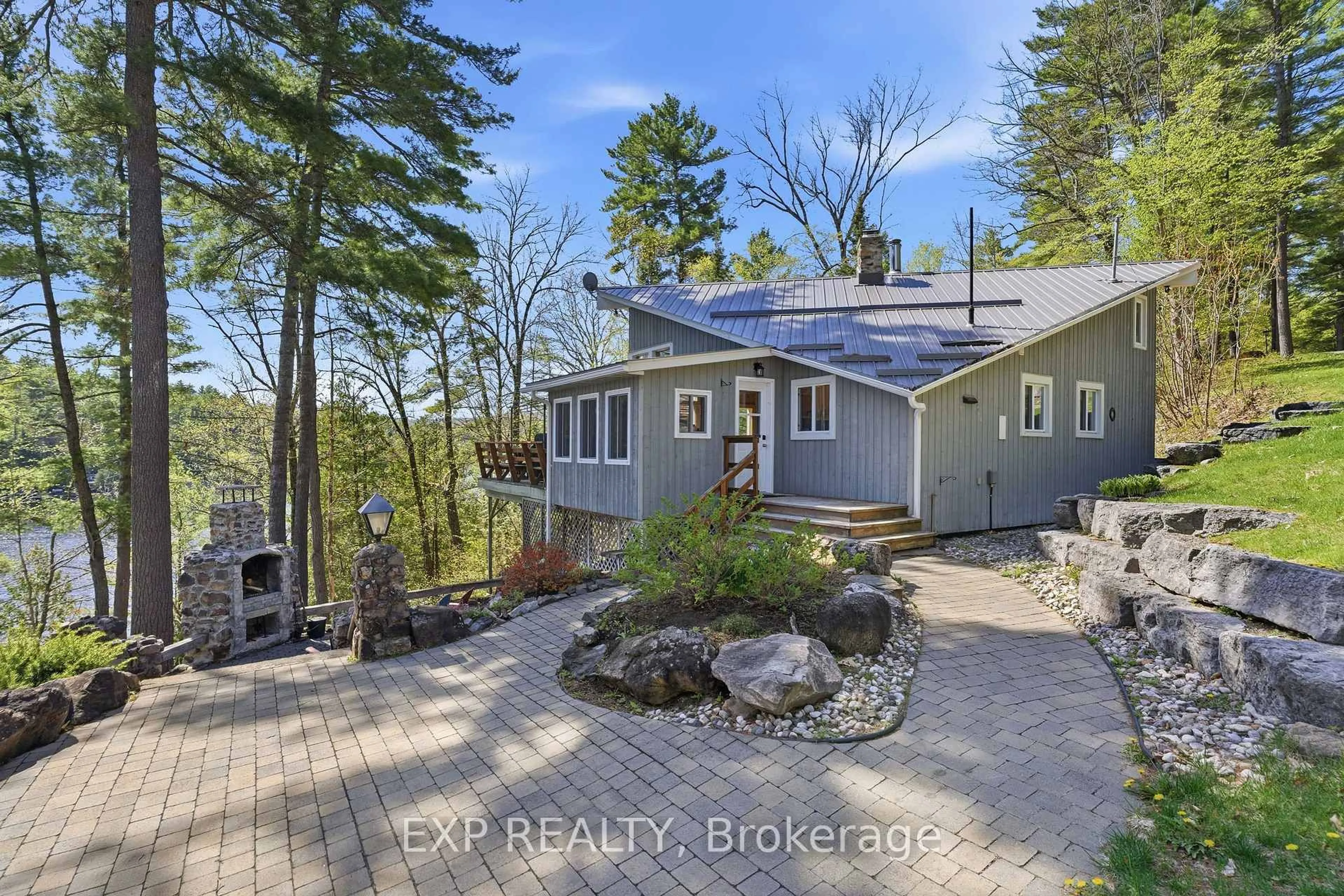 A pic from outside/outdoor area/front of a property/back of a property/a pic from drone, water/lake/river/ocean view for 4 Stackwall Lane, Battersea Ontario K0H 1H0