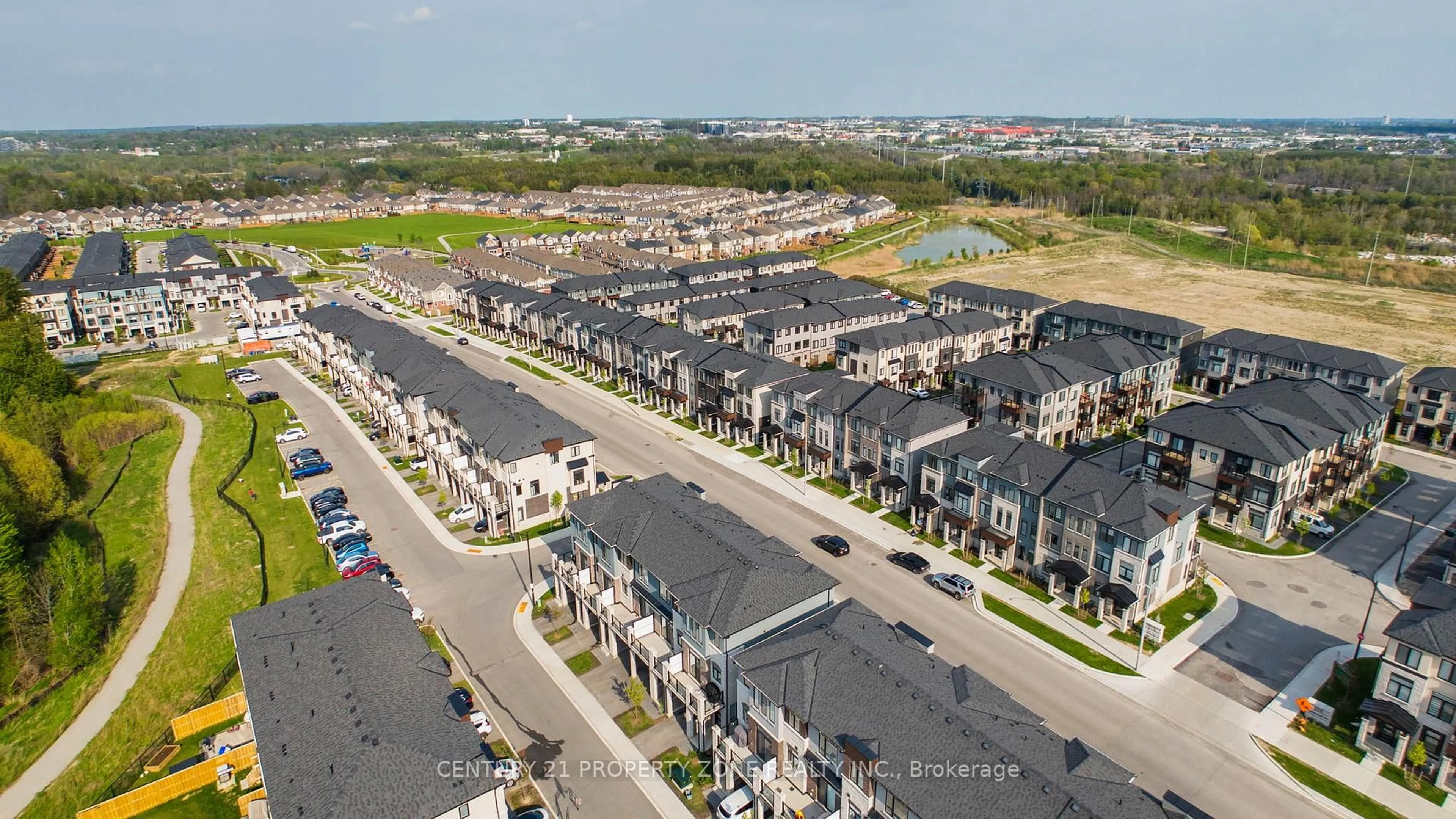 A pic from outside/outdoor area/front of a property/back of a property/a pic from drone, street for 290 Equestrian Way #45, Cambridge Ontario N3E 0E7