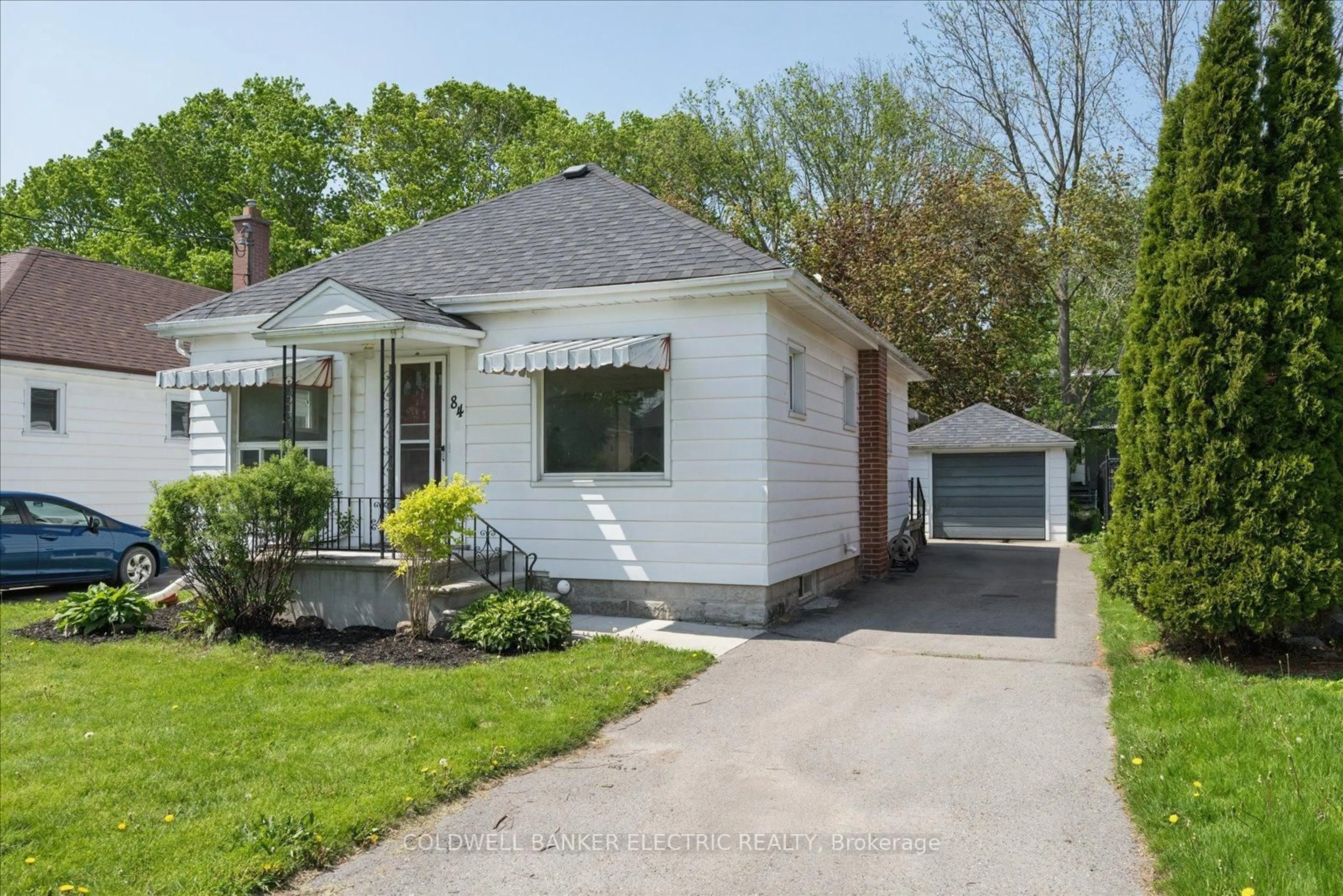 Home with vinyl exterior material, street for 84 Ware St, Peterborough Ontario K9J 2B7