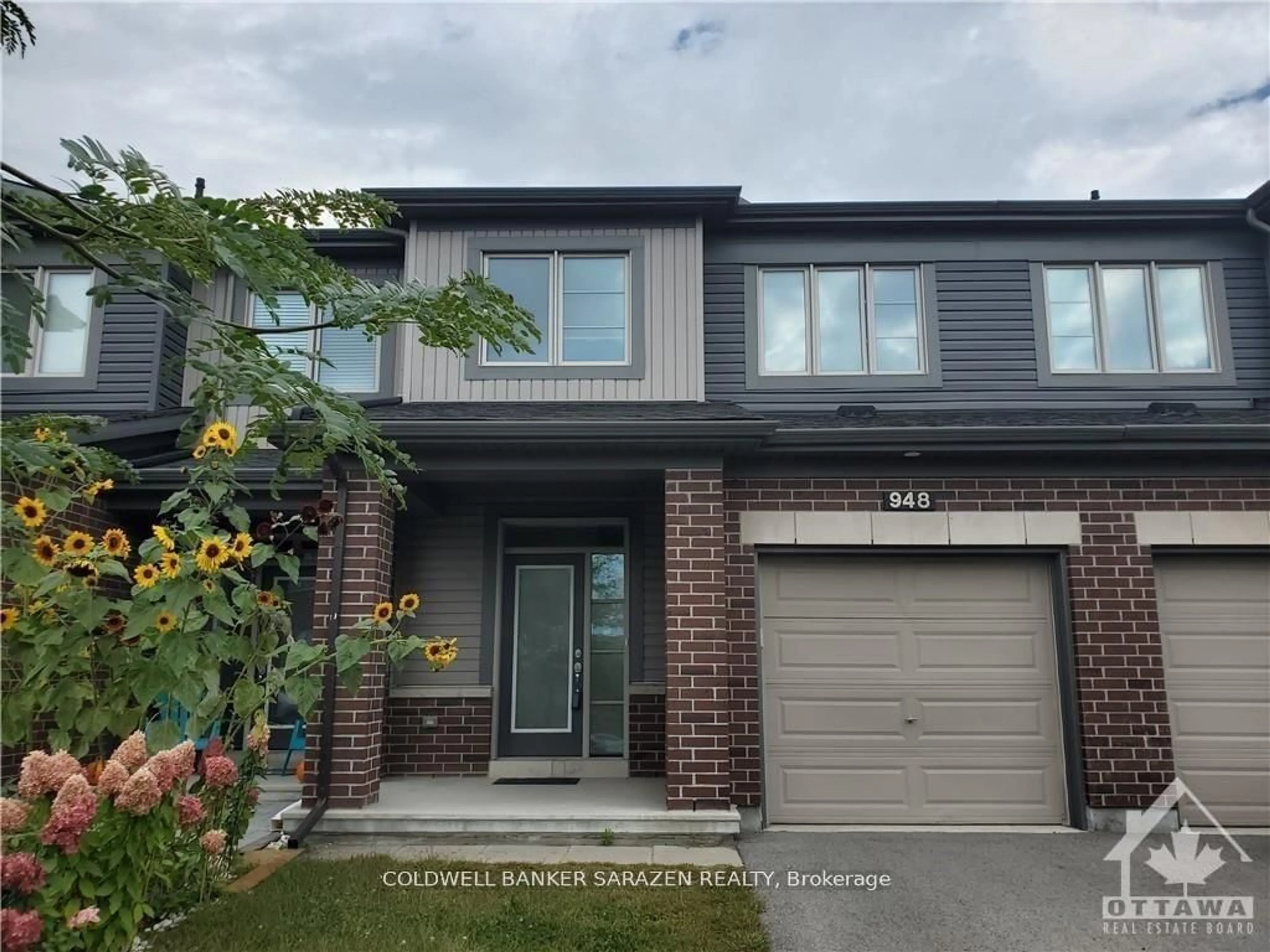 Home with brick exterior material, street for 948 Kilbirnie Dr, Ottawa Ontario K2J 6G2