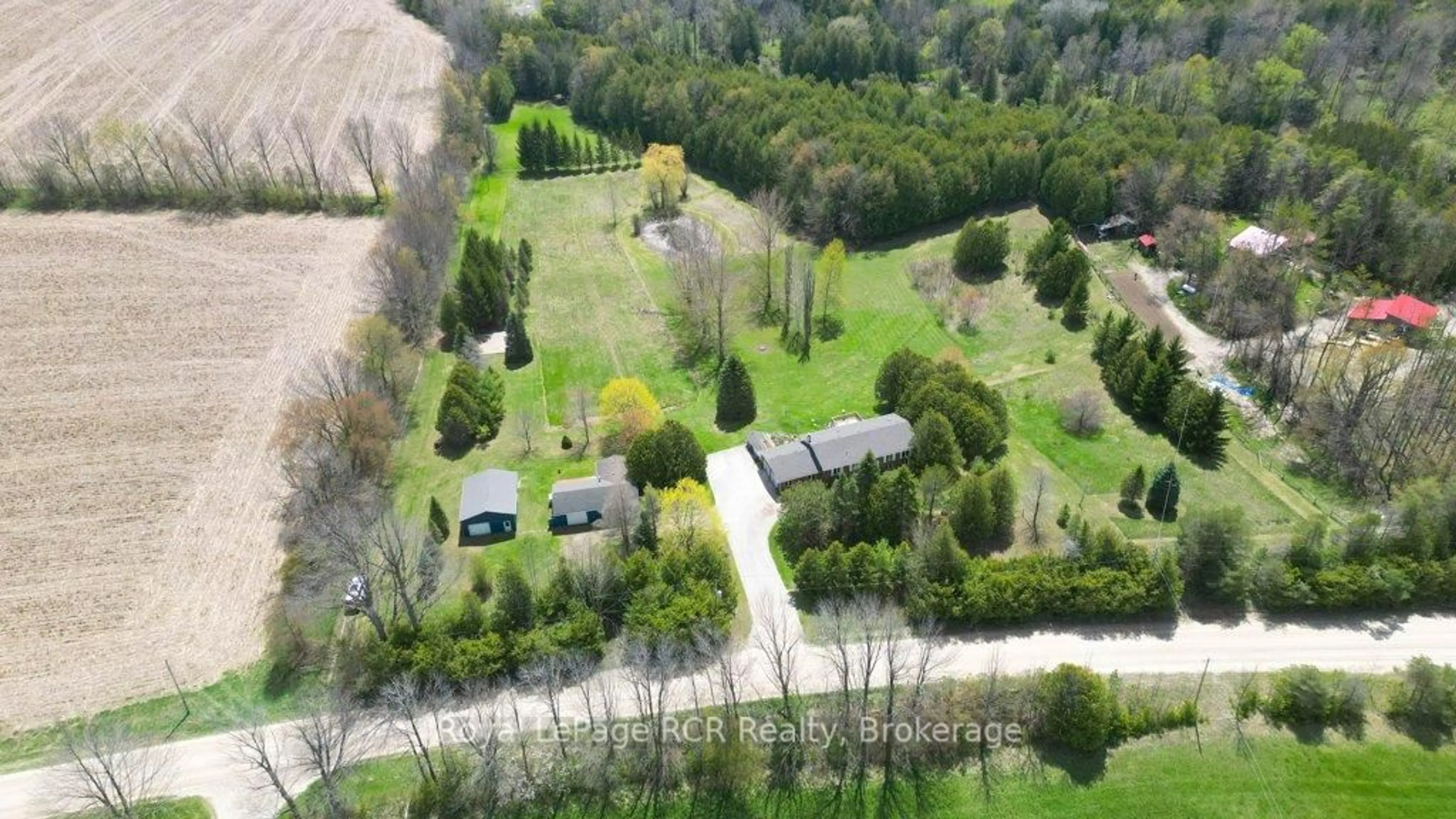 A pic from outside/outdoor area/front of a property/back of a property/a pic from drone, forest/trees view for 102034 Concession 6 Concession, West Grey Ontario N0G 1C0