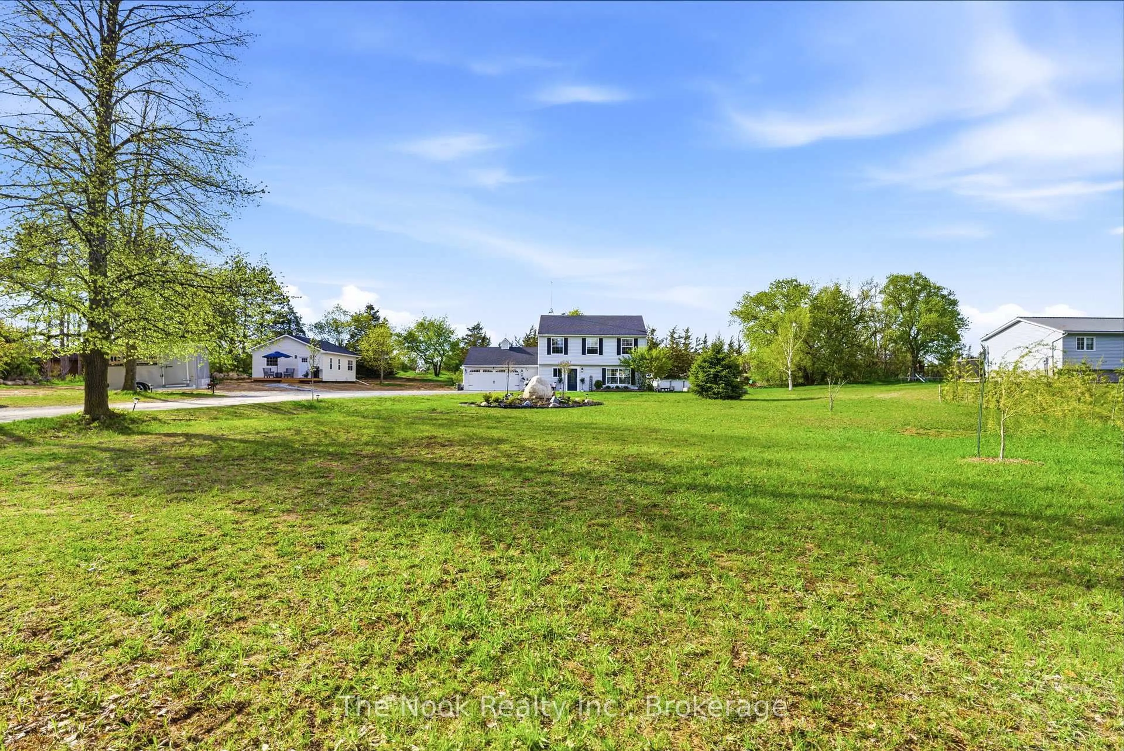 A pic from outside/outdoor area/front of a property/back of a property/a pic from drone, water/lake/river/ocean view for 158 Downs Rd, Quinte West Ontario K8V 0A9