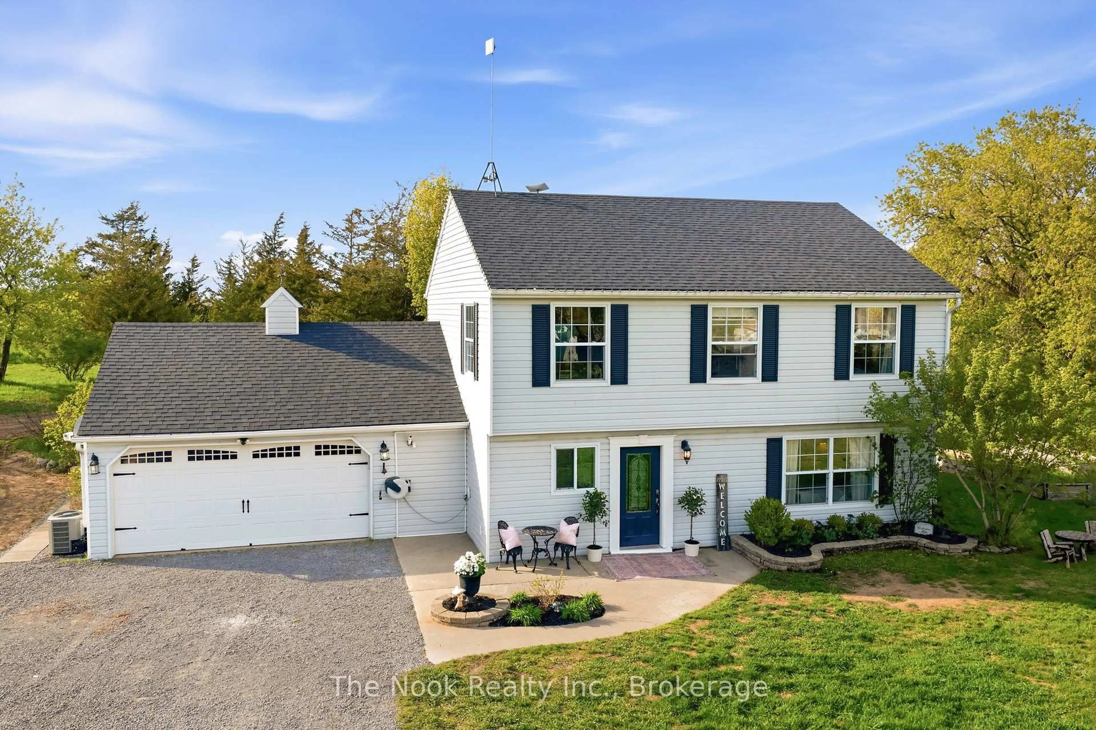 A pic from outside/outdoor area/front of a property/back of a property/a pic from drone, street for 158 Downs Rd, Quinte West Ontario K8V 0A9