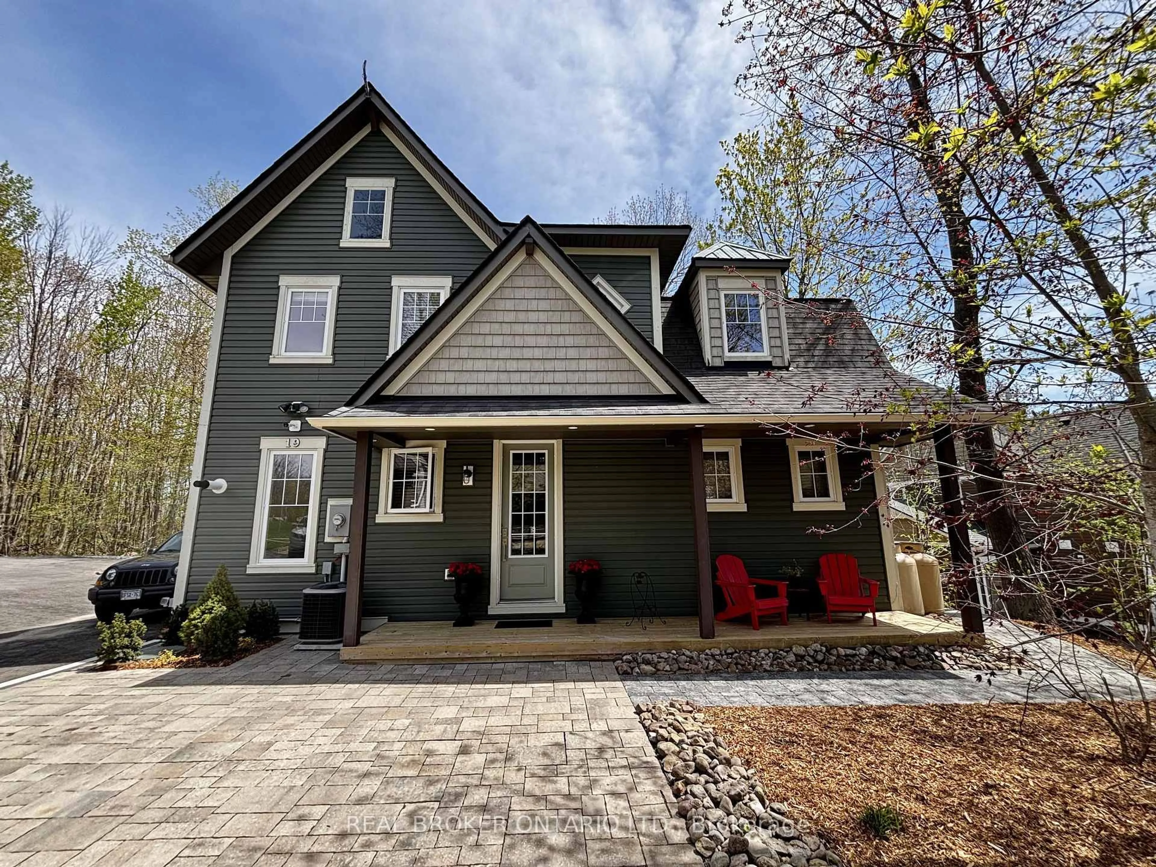 Home with brick exterior material, street for 19 Marina Village Dr, Georgian Bay Ontario L0K 1S0