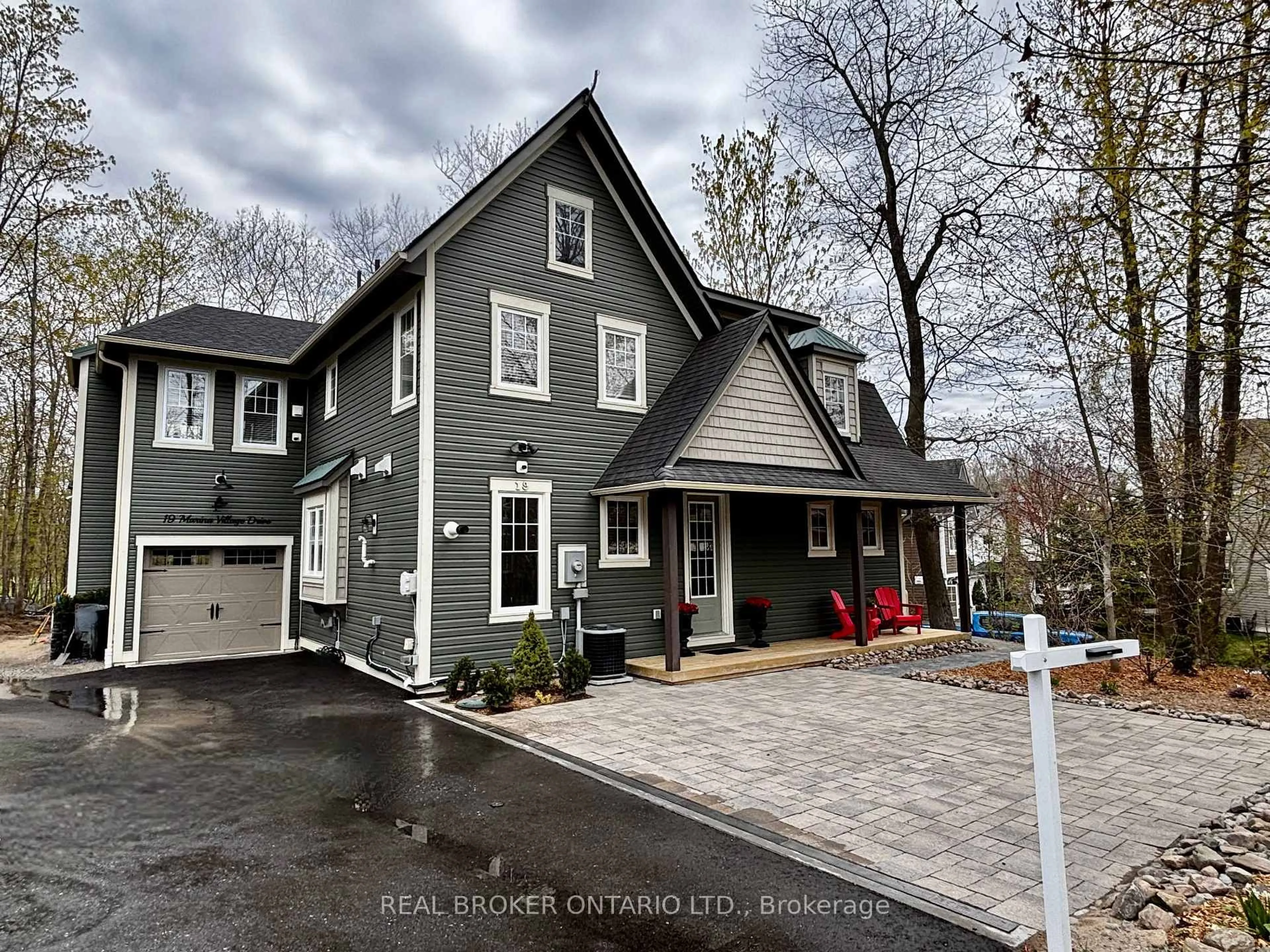 Home with brick exterior material, street for 19 Marina Village Dr, Georgian Bay Ontario L0K 1S0