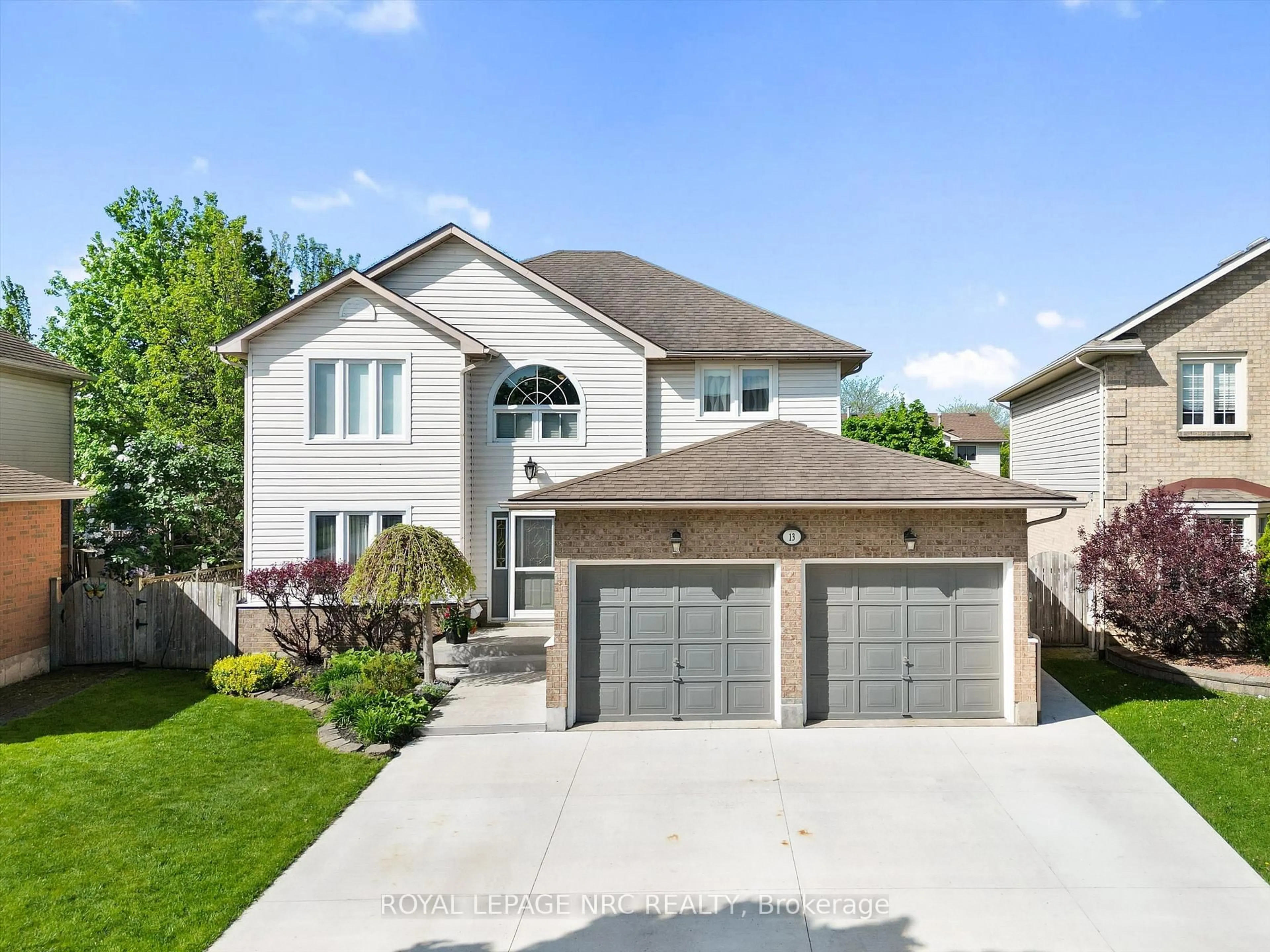 Home with vinyl exterior material, street for 13 Crysler Cres, Thorold Ontario L2V 5A2