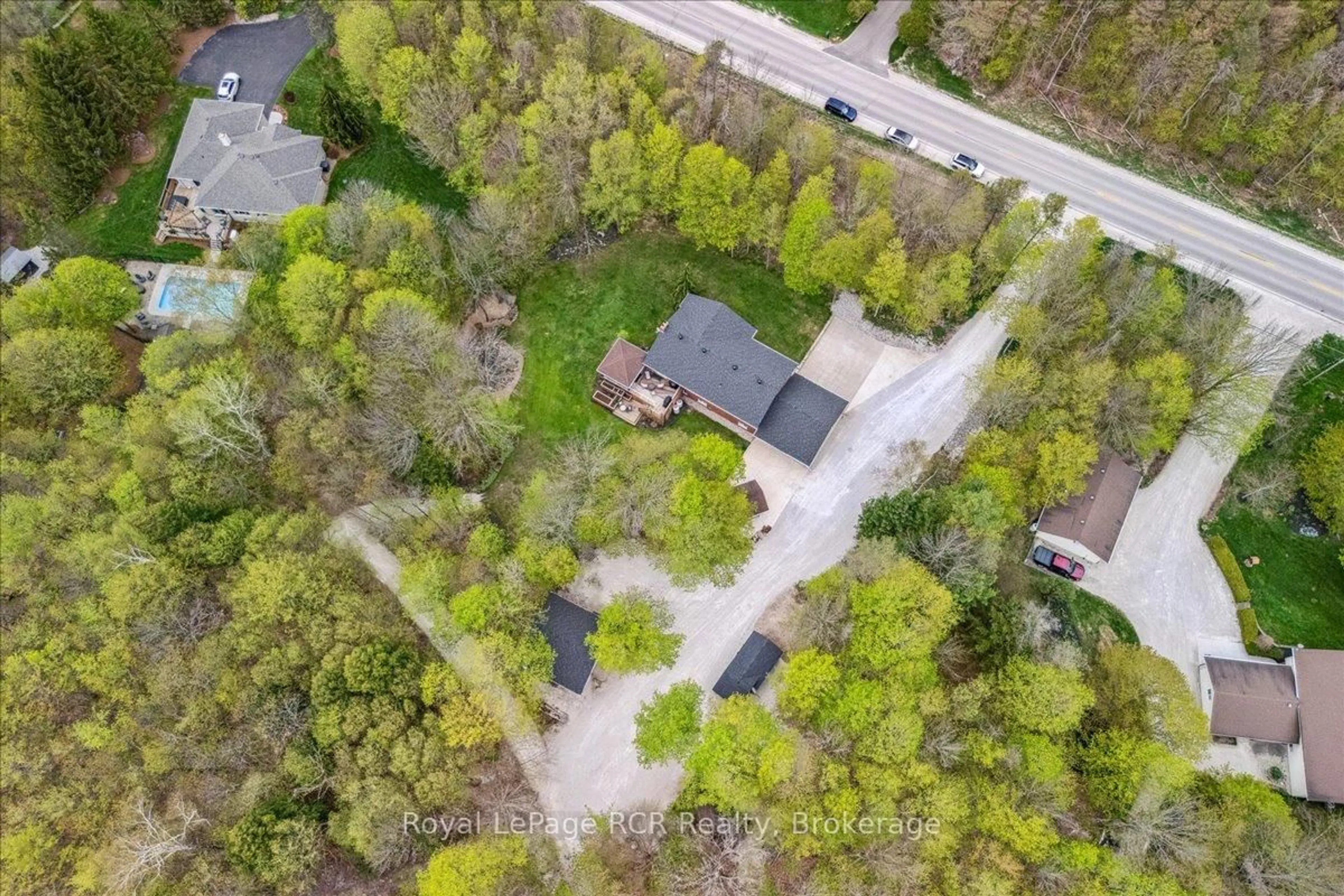 A pic from outside/outdoor area/front of a property/back of a property/a pic from drone, street for 103488 Grey 18 Rd, Meaford Ontario N4K 5N8