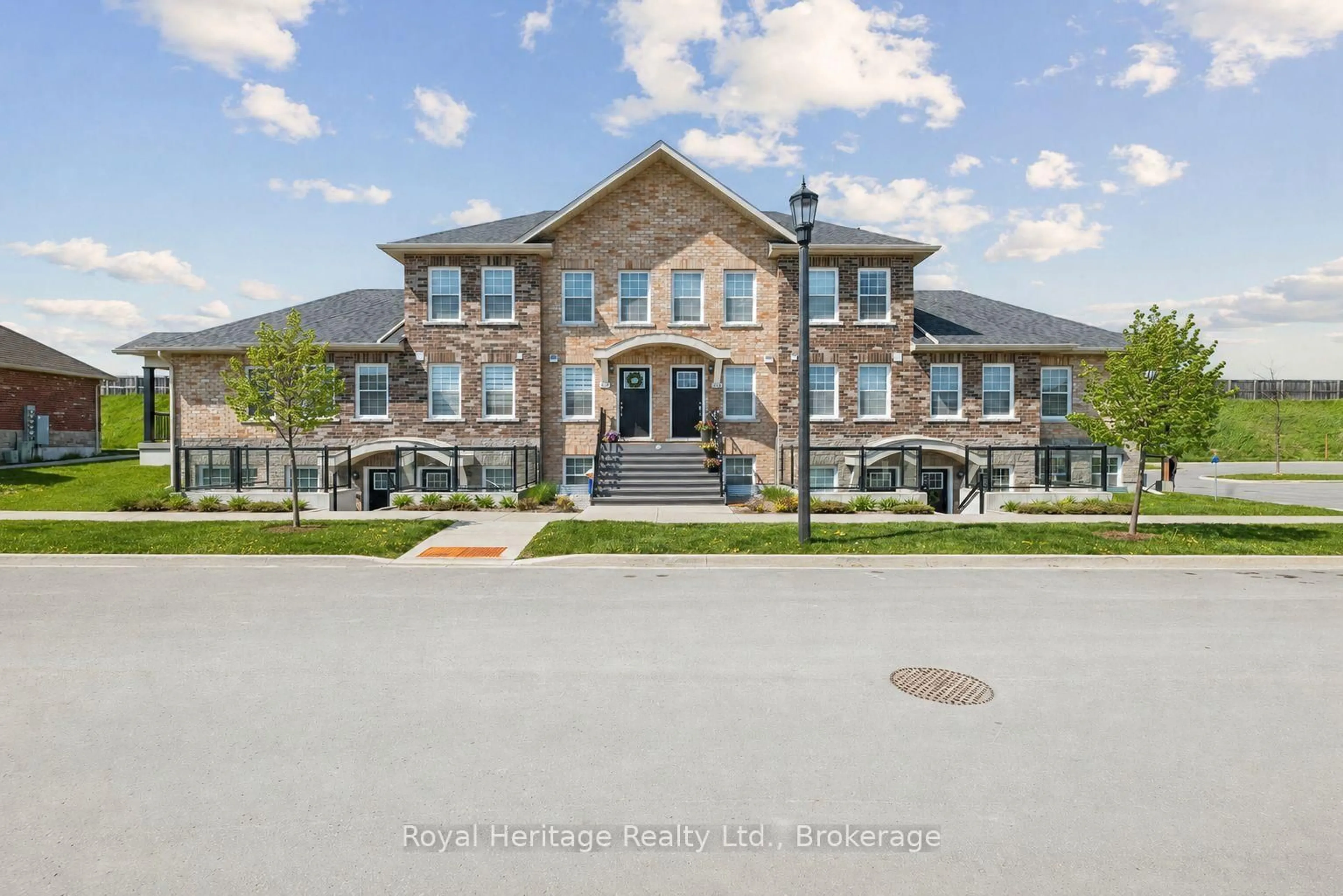 A pic from outside/outdoor area/front of a property/back of a property/a pic from drone, building for 450 Lonsberry Dr #304, Cobourg Ontario K9A 0K4