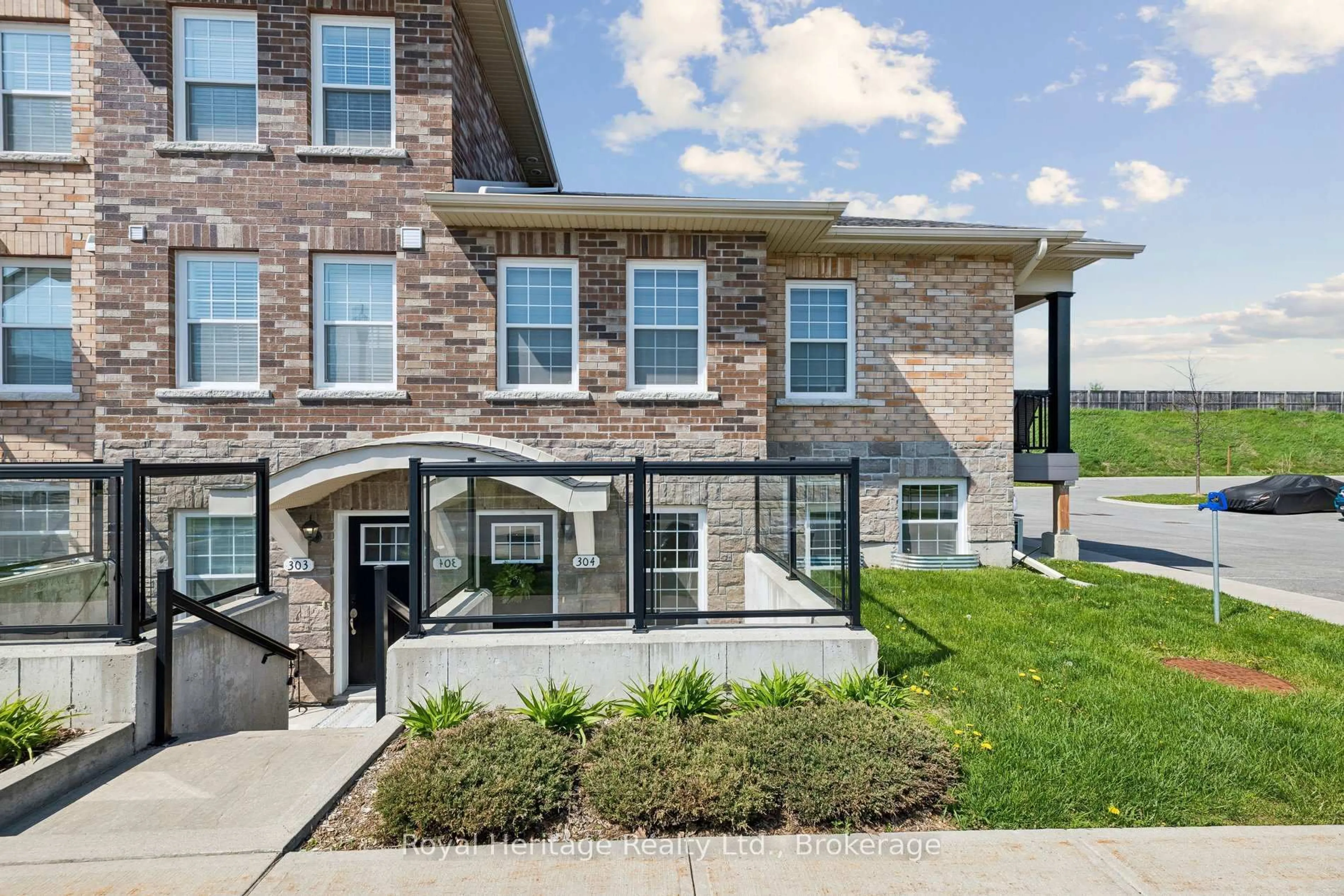 Home with brick exterior material, street for 450 Lonsberry Dr #304, Cobourg Ontario K9A 0K4
