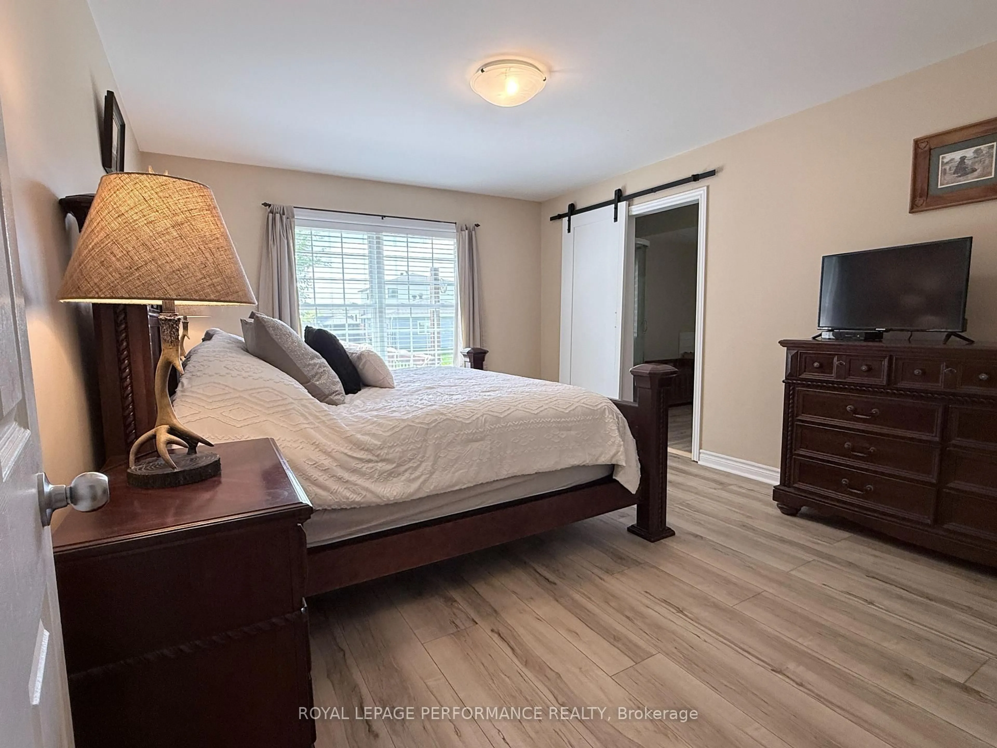 Bedroom with bed, wood/laminate floor for 40 Lori Lane, North Dundas Ontario K0C 2H0