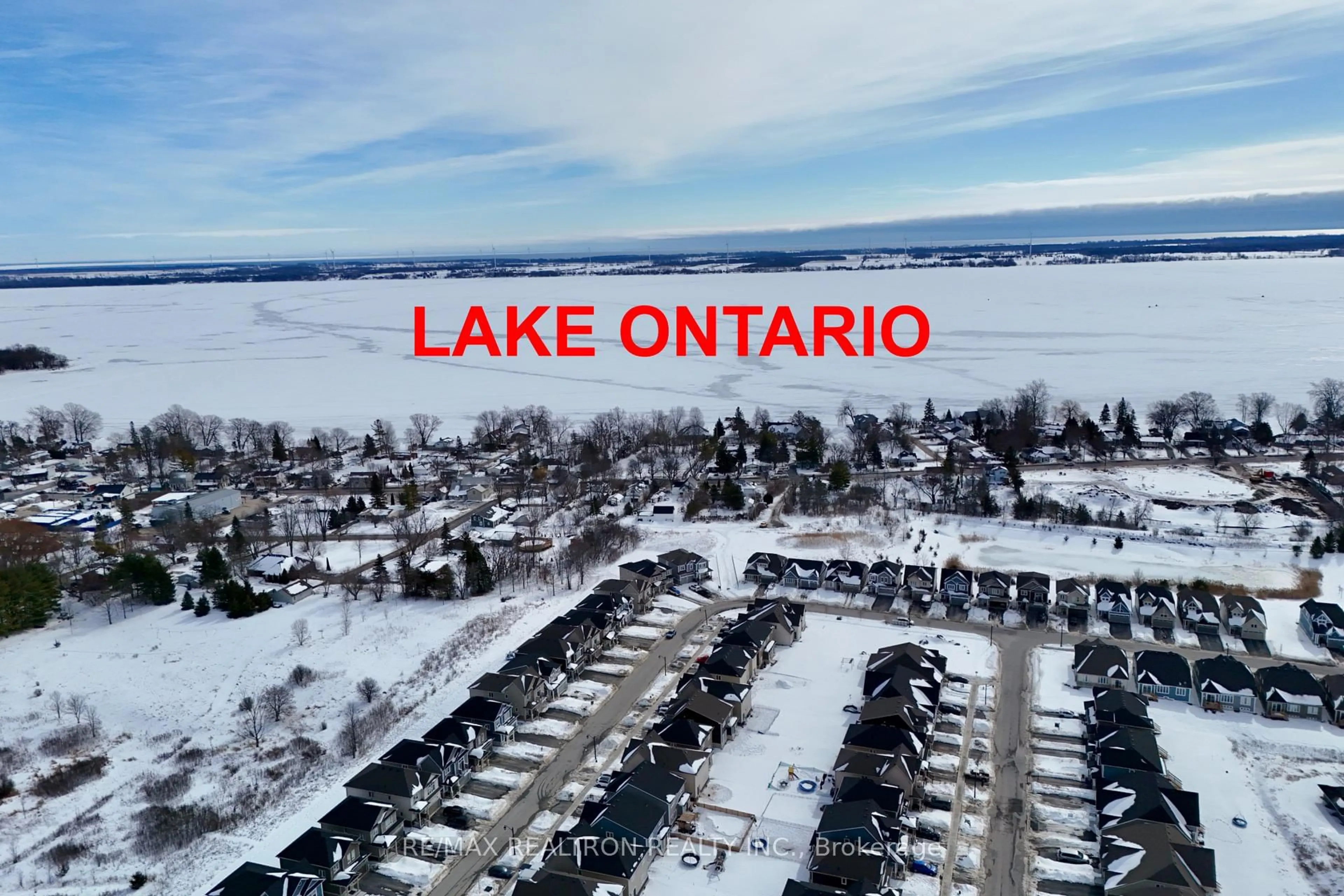 A pic from outside/outdoor area/front of a property/back of a property/a pic from drone, water/lake/river/ocean view for 74 Golf Links Dr, Loyalist Ontario K0H 0B4