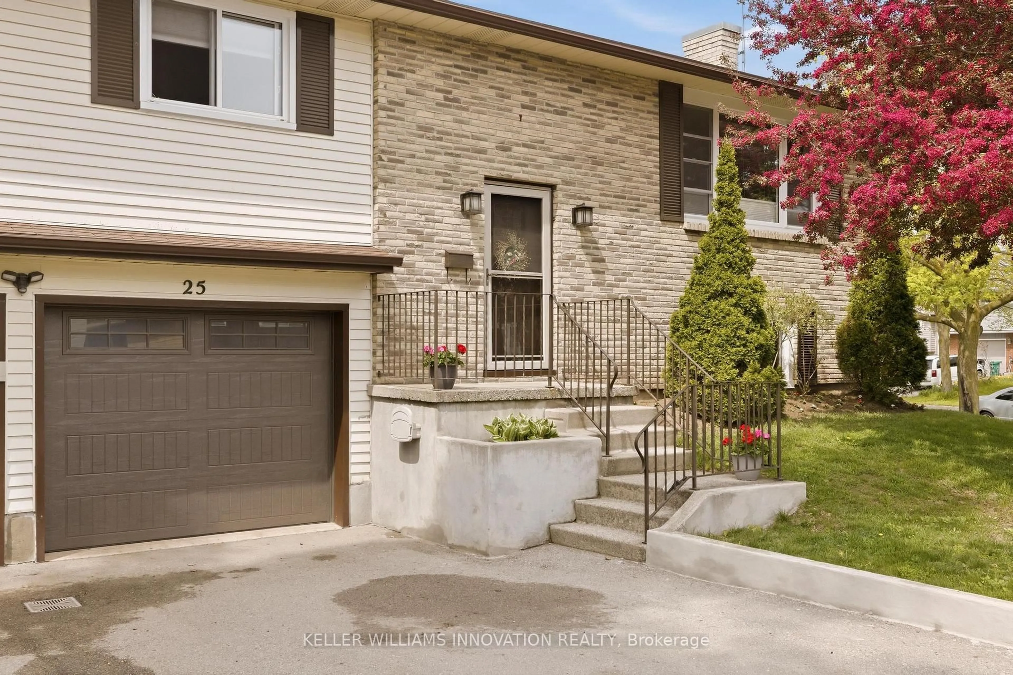 Home with brick exterior material, street for 25 Greenock Dr, Kitchener Ontario N2E 2J9