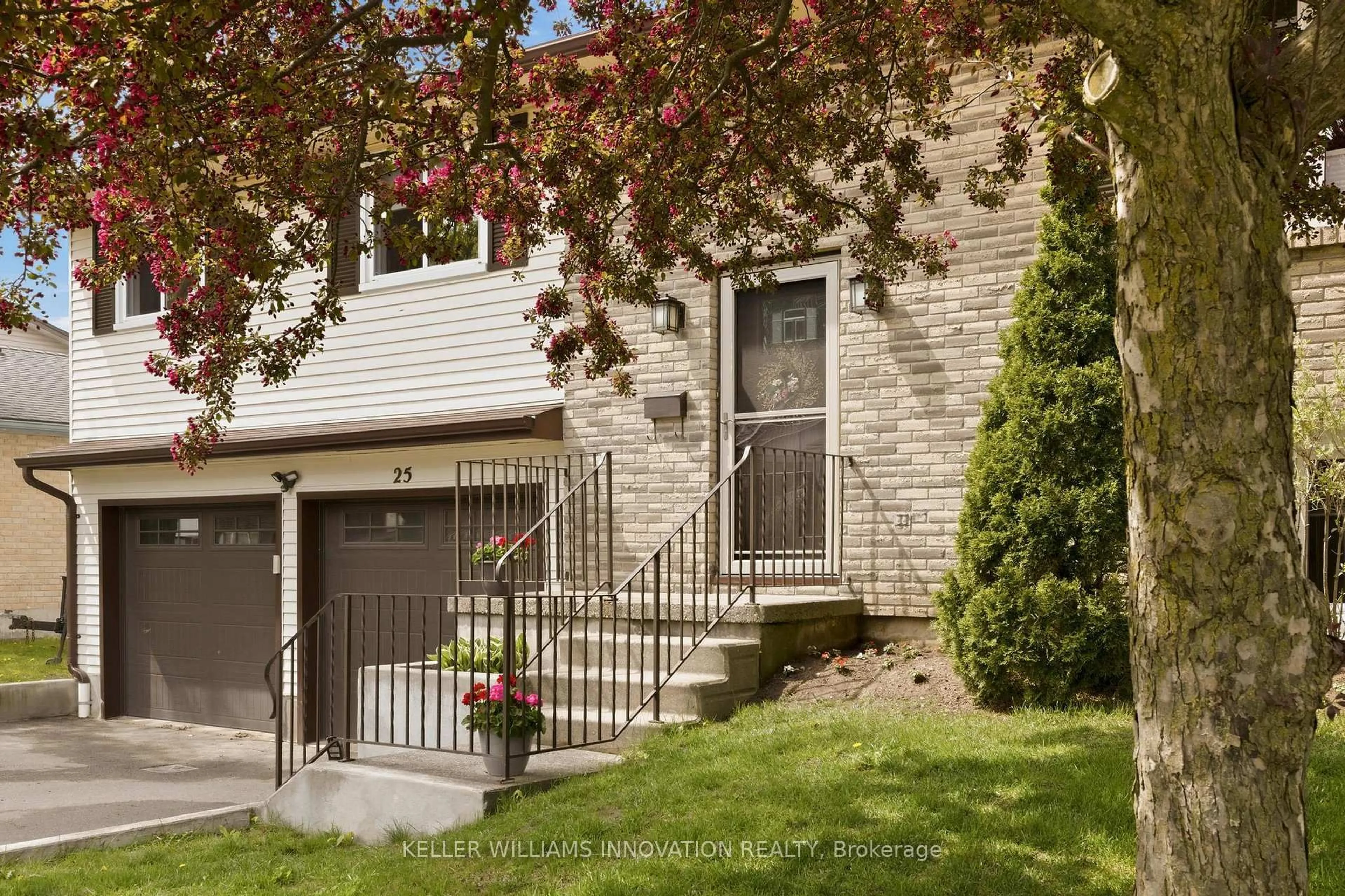 Home with brick exterior material, street for 25 Greenock Dr, Kitchener Ontario N2E 2J9