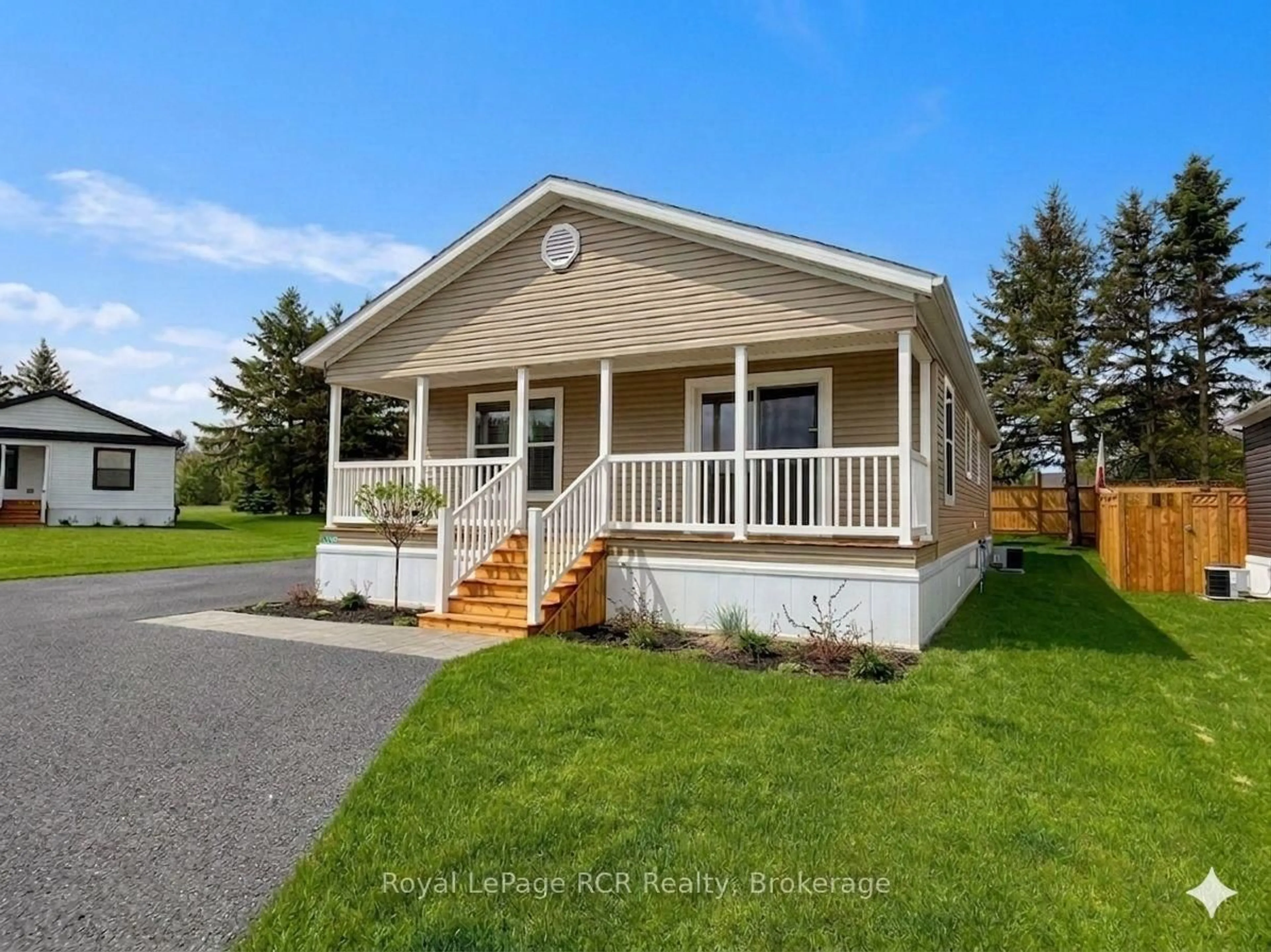Home with vinyl exterior material, street for 210 Spruce Dr, West Grey Ontario N4N 3B8