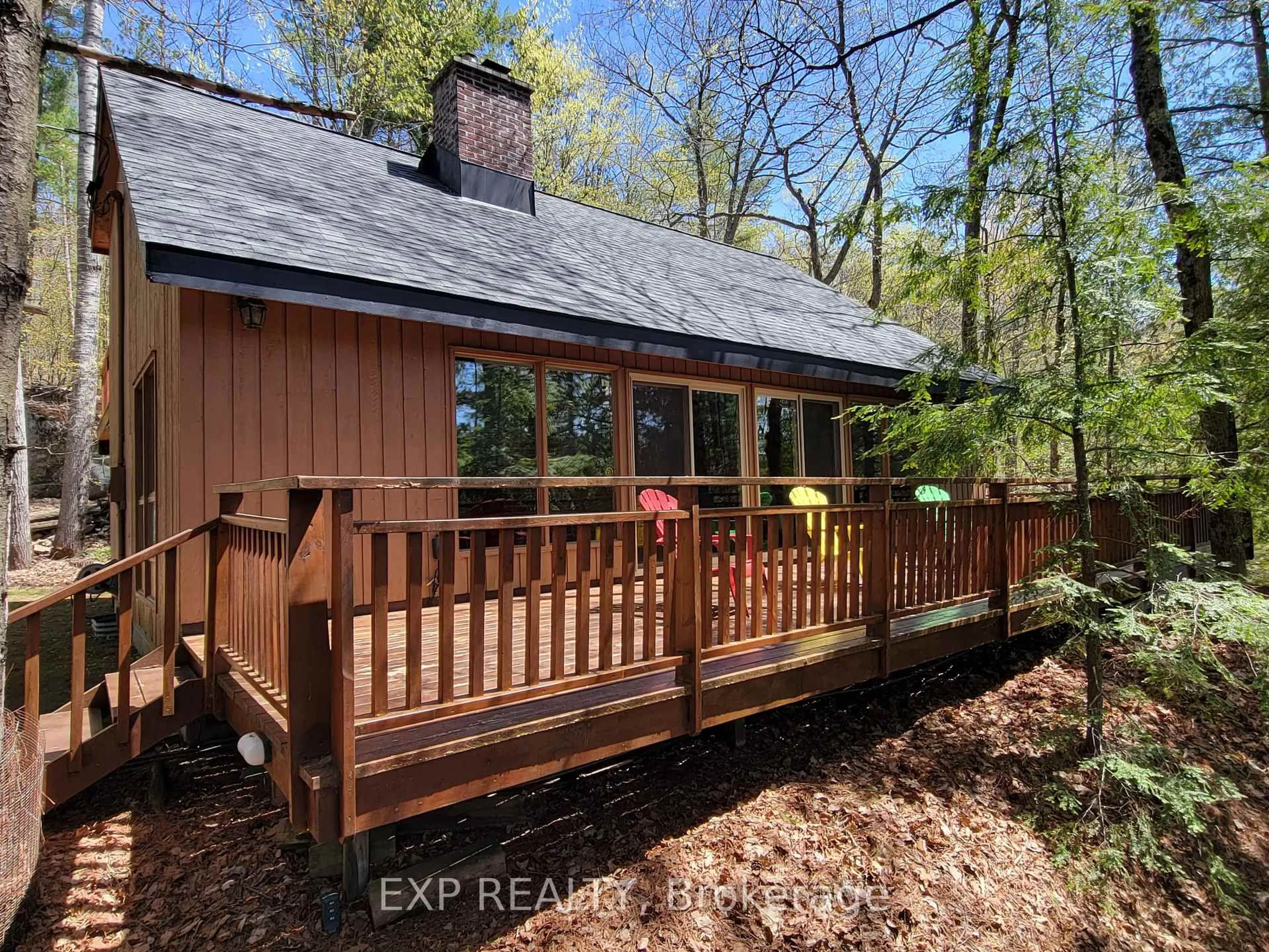 Home with vinyl exterior material, forest/trees view for 71 Quail Lane, North Kawartha Ontario K1L 1A0