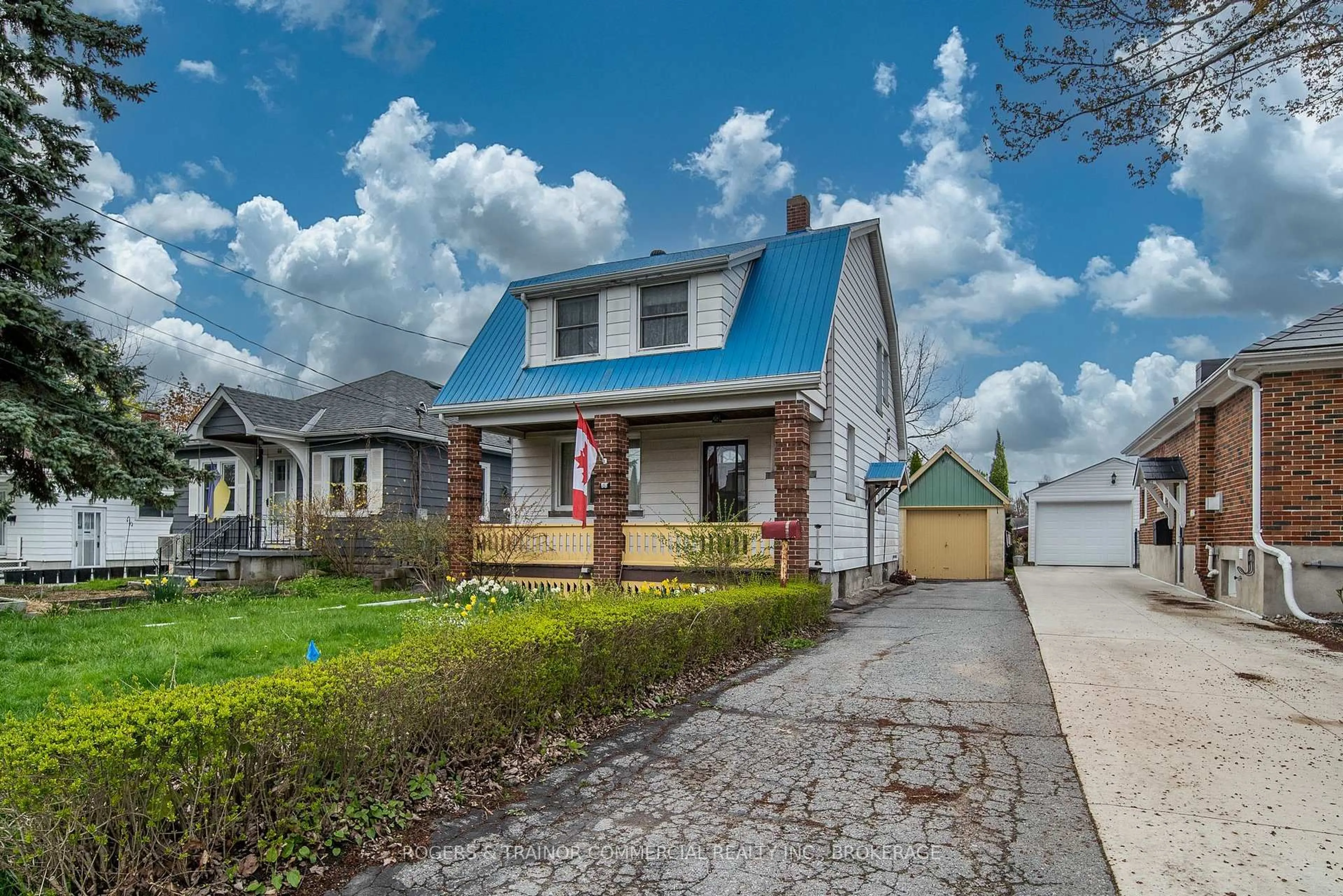 Home with vinyl exterior material, street for 68 Scott St, Kingston Ontario K7L 1L7