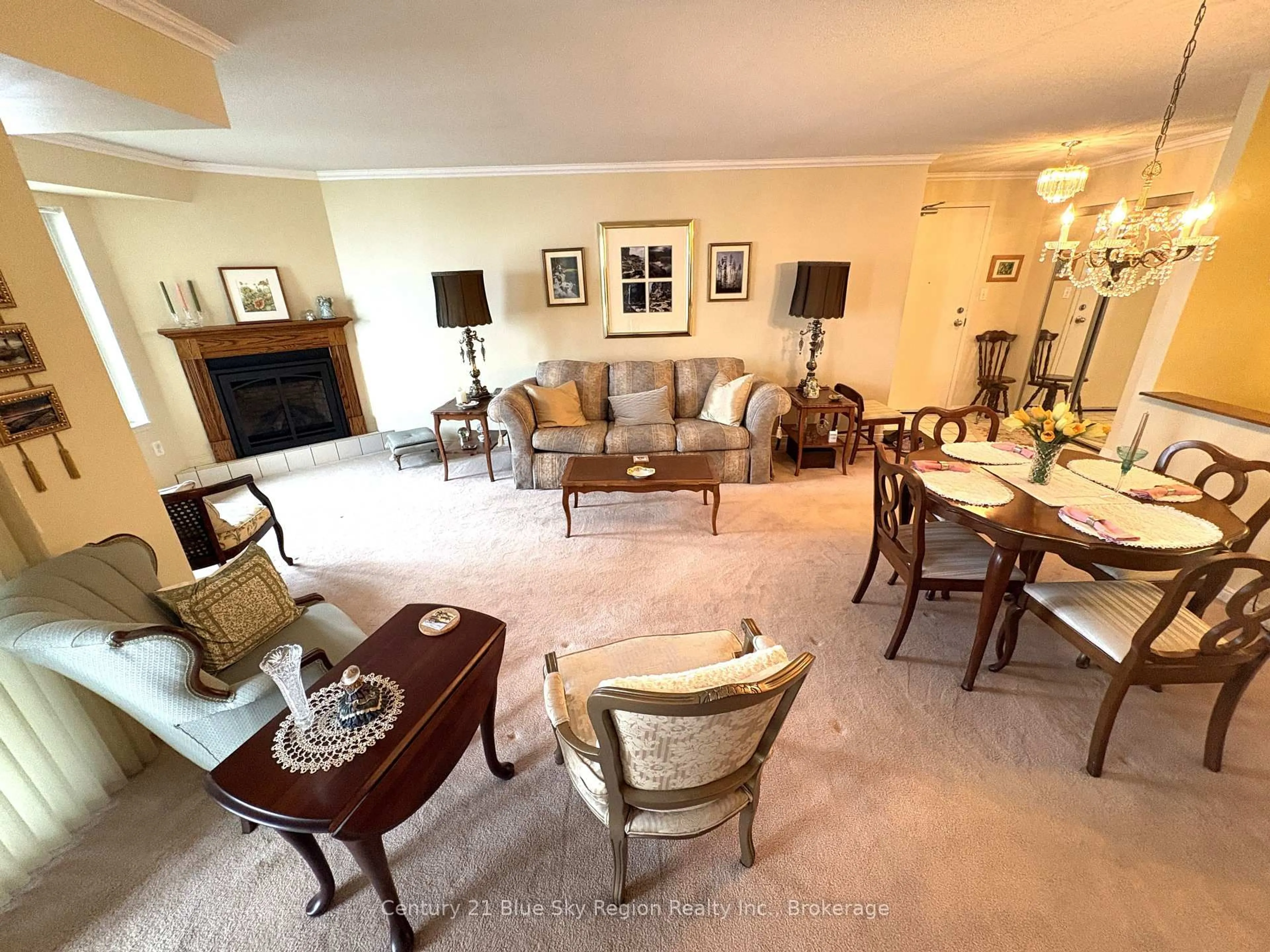 Living room with furniture, carpet floor for 469 Lakeshore Dr #301, North Bay Ontario P1A 2E2