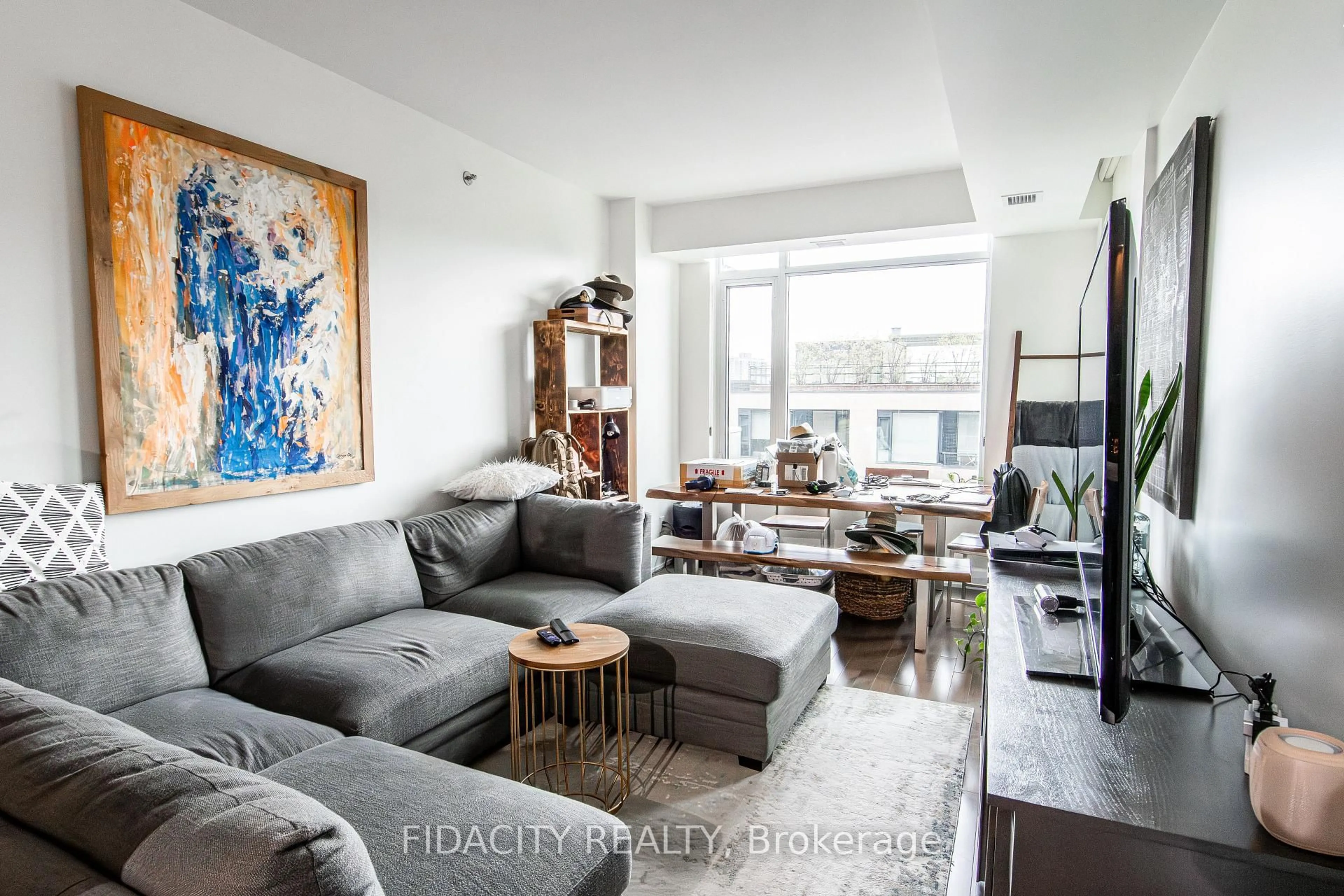 Living room with furniture, unknown for 108 Richmond Rd #607, Ottawa Ontario K1Z 0B3
