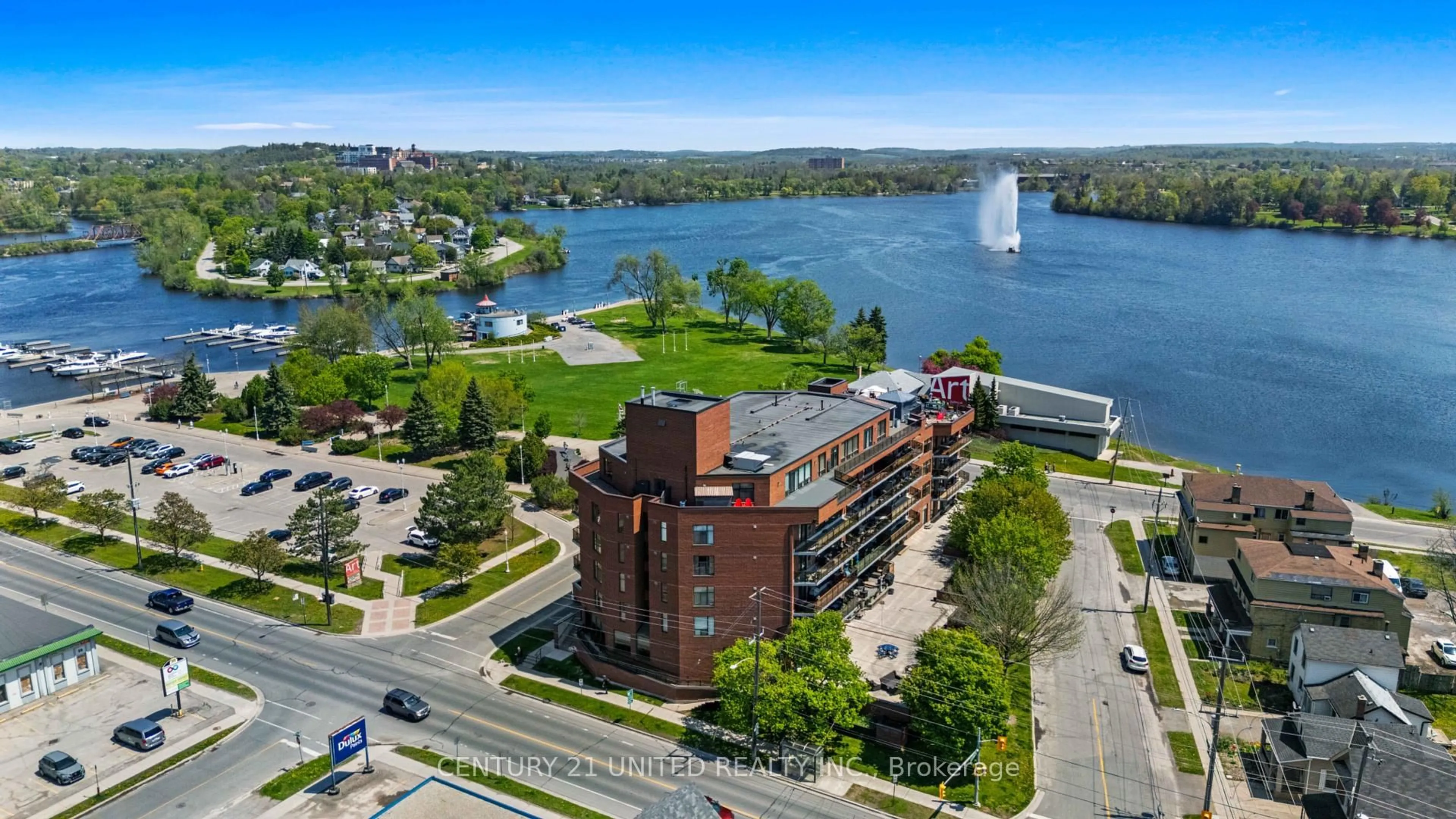 A pic from outside/outdoor area/front of a property/back of a property/a pic from drone, water/lake/river/ocean view for 2 George St #104, Peterborough Ontario K9J 8K8