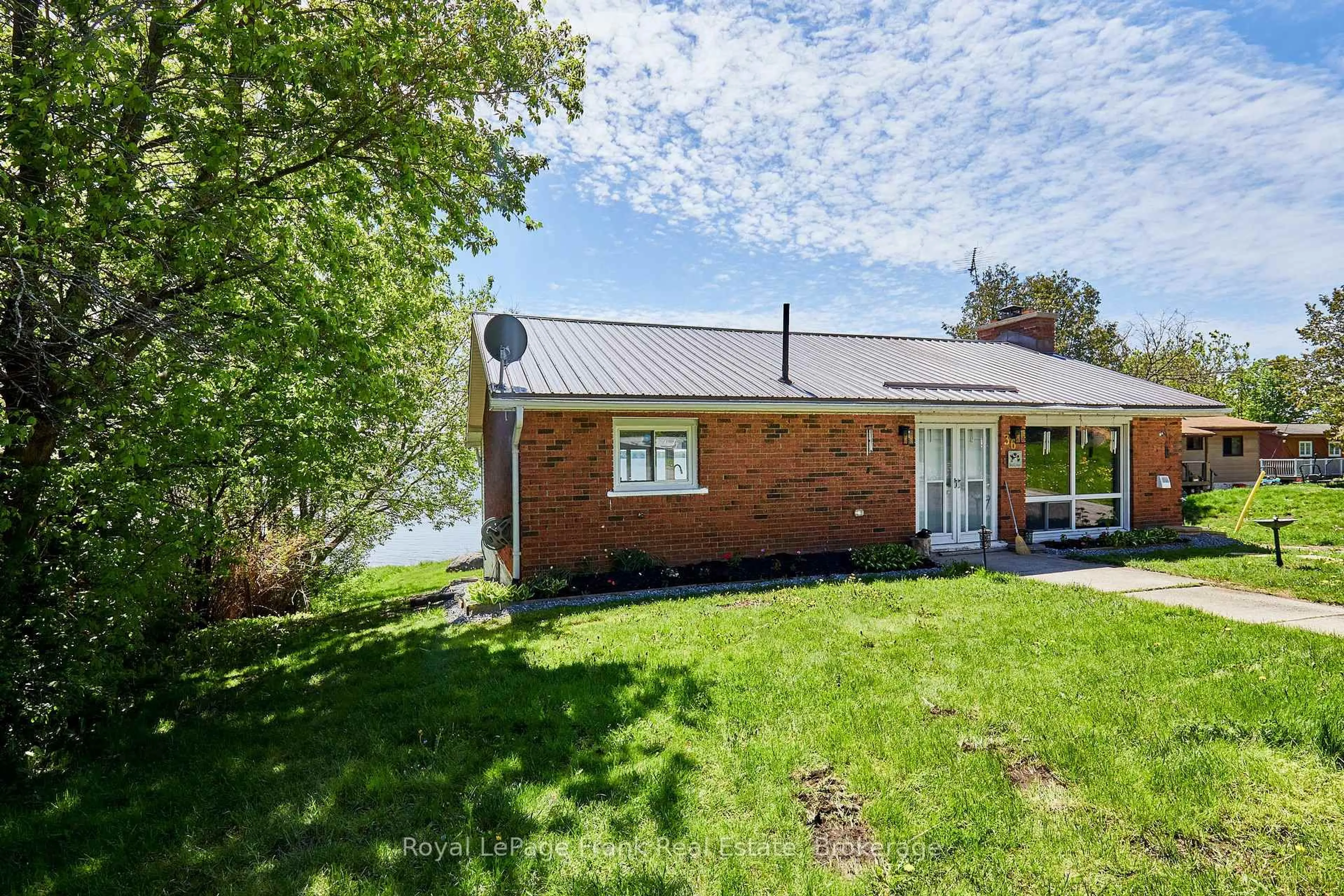A pic from outside/outdoor area/front of a property/back of a property/a pic from drone, water/lake/river/ocean view for 36 Summer Dr, Kawartha Lakes Ontario K0M 2C0