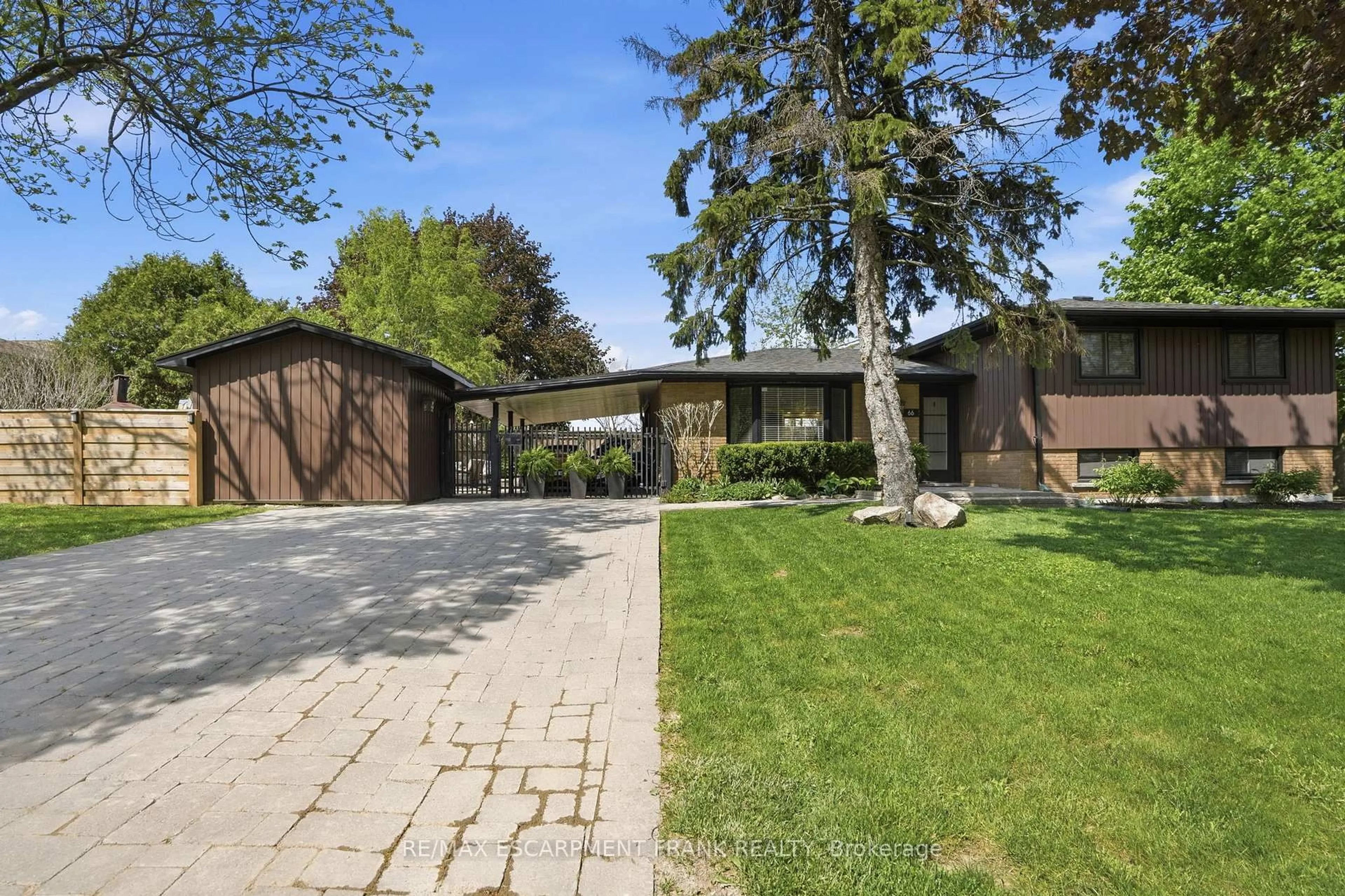 Home with brick exterior material, street for 66 Purnell Dr, Hamilton Ontario L9C 4Y3