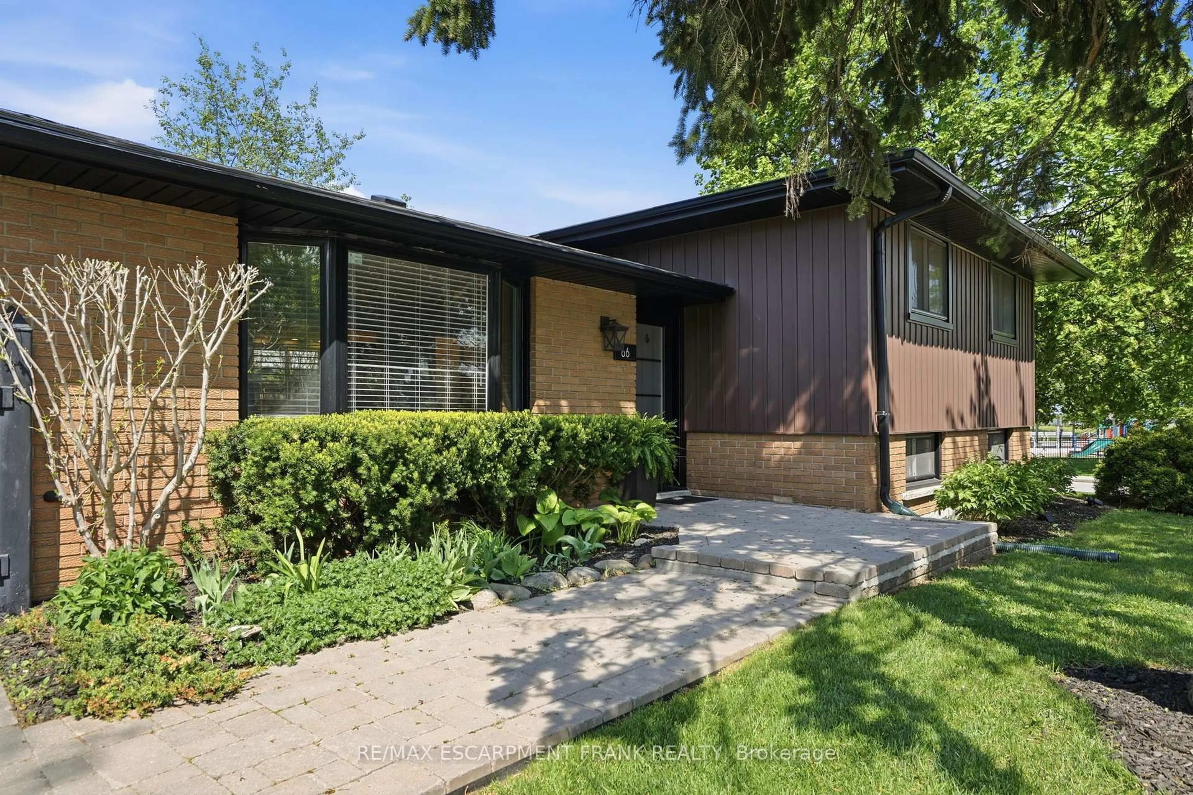 Home with brick exterior material, street for 66 Purnell Dr, Hamilton Ontario L9C 4Y3