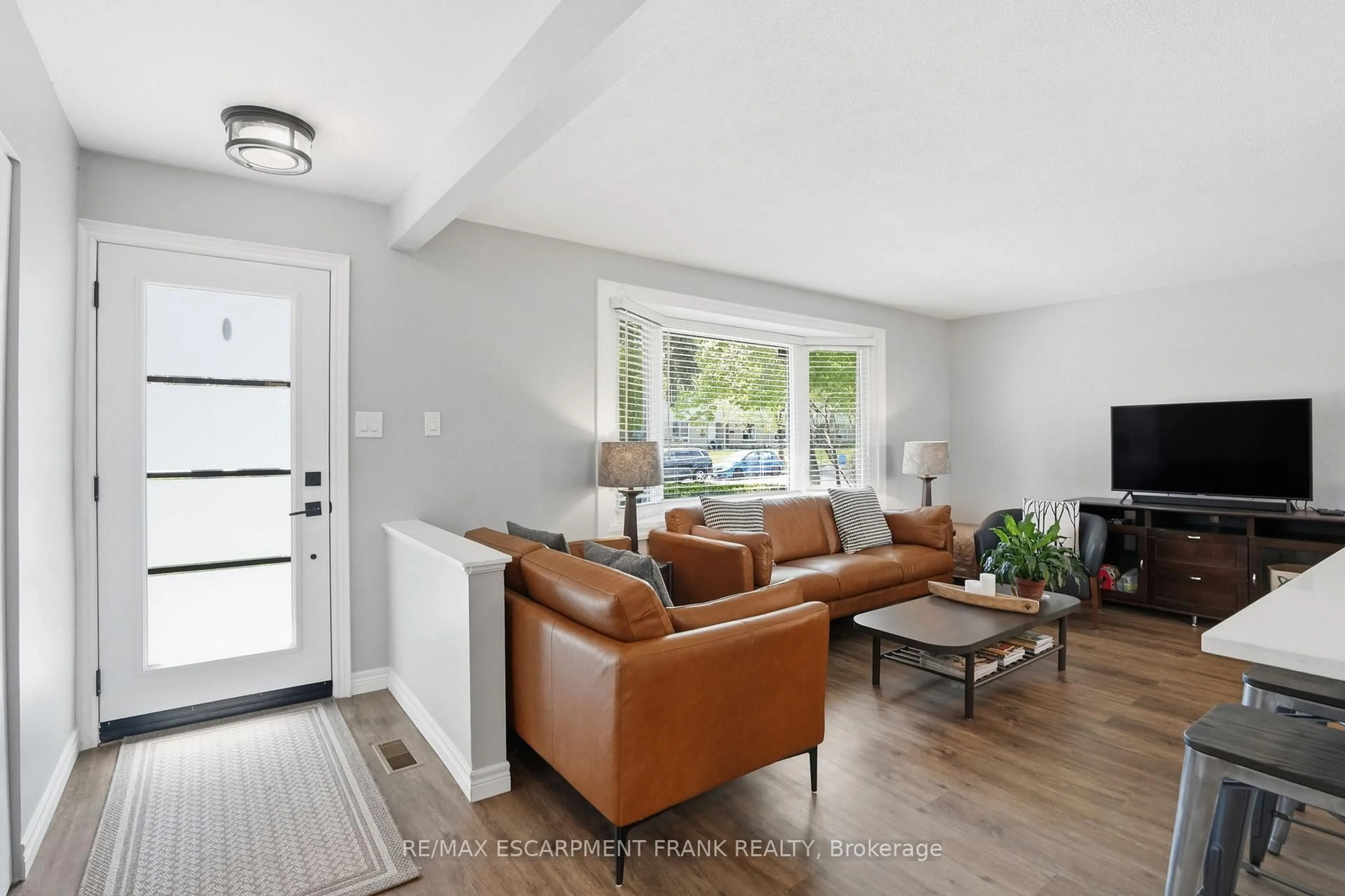 Living room with furniture, unknown for 66 Purnell Dr, Hamilton Ontario L9C 4Y3