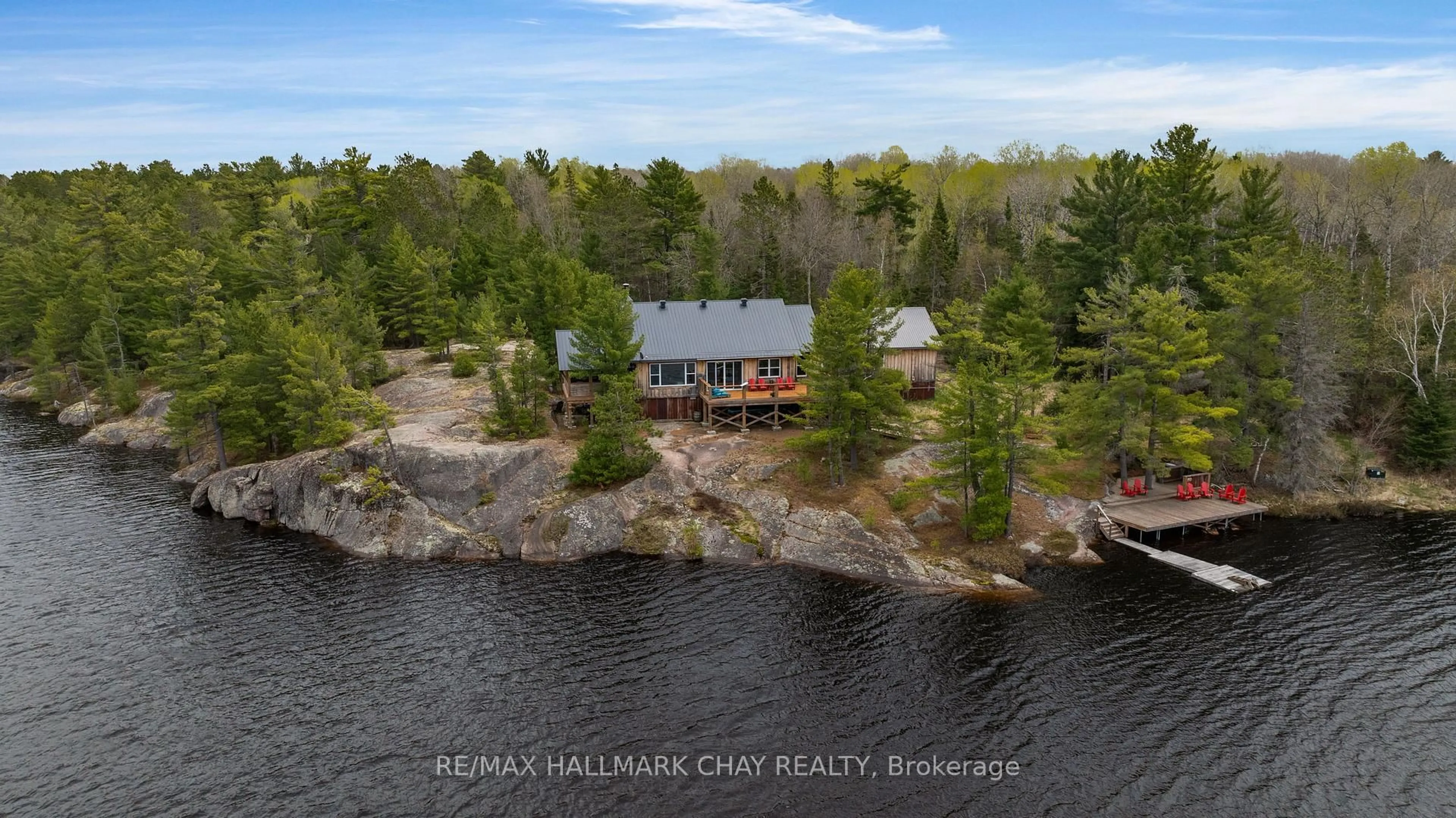 A pic from outside/outdoor area/front of a property/back of a property/a pic from drone, water/lake/river/ocean view for 164 Perch Lake Rd, West Nipissing Ontario P0M 2K0