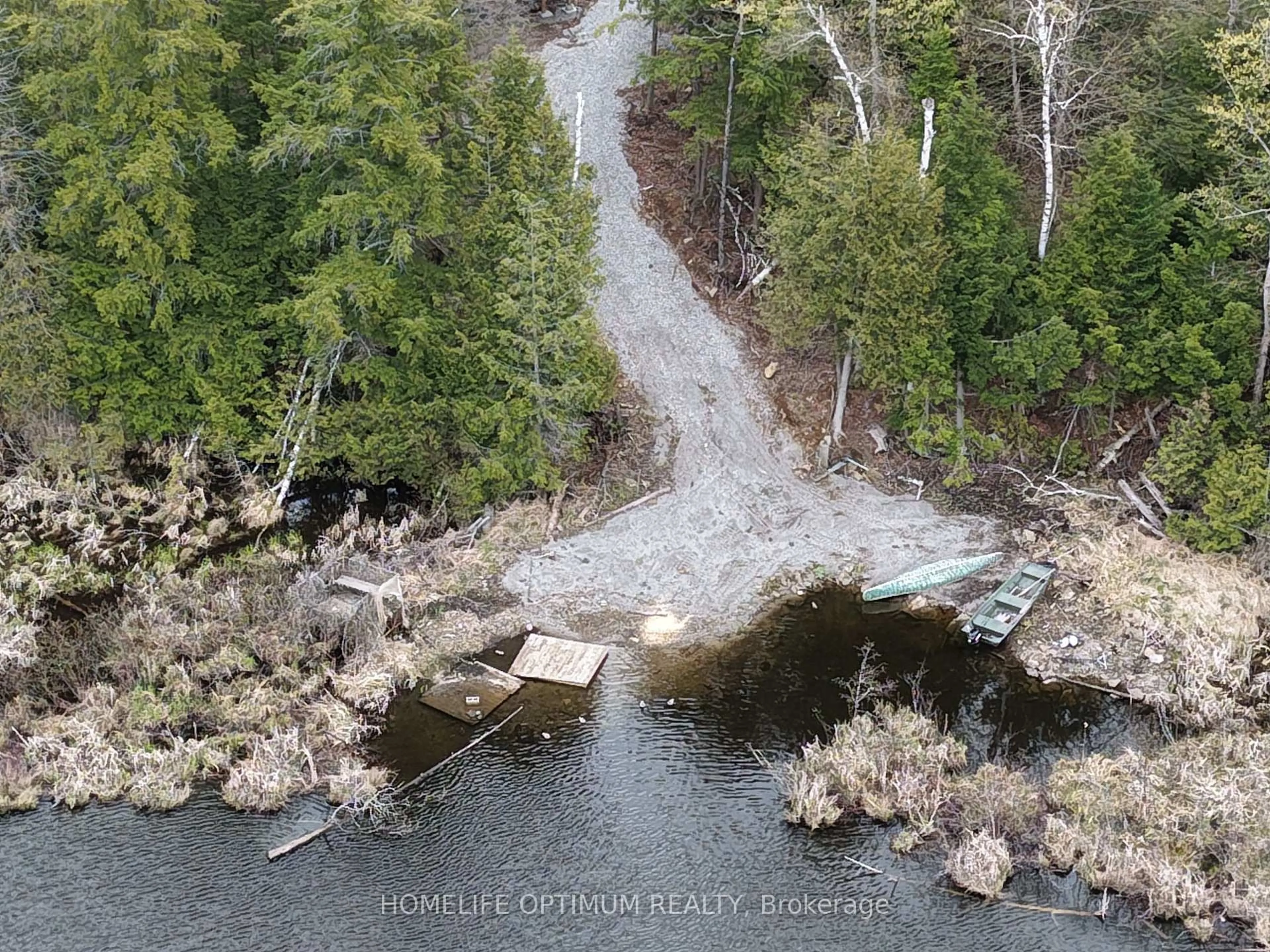 A pic from outside/outdoor area/front of a property/back of a property/a pic from drone, water/lake/river/ocean view for 1086 Crystal Lake Rd, Trent Lakes Ontario K0M 2A0