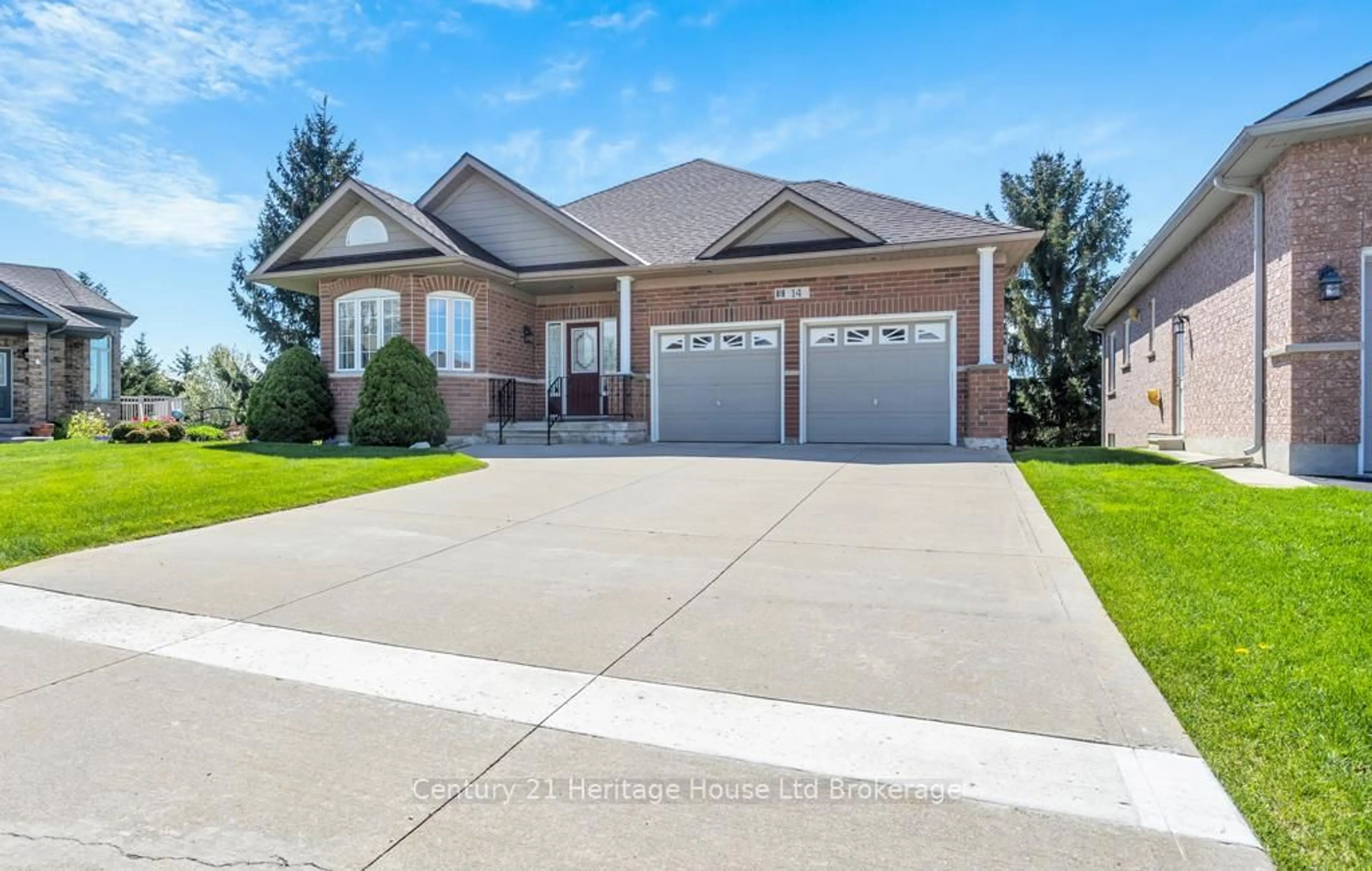 Home with brick exterior material, street for 14 Green Gable Pl, Woodstock Ontario N4T 1W6