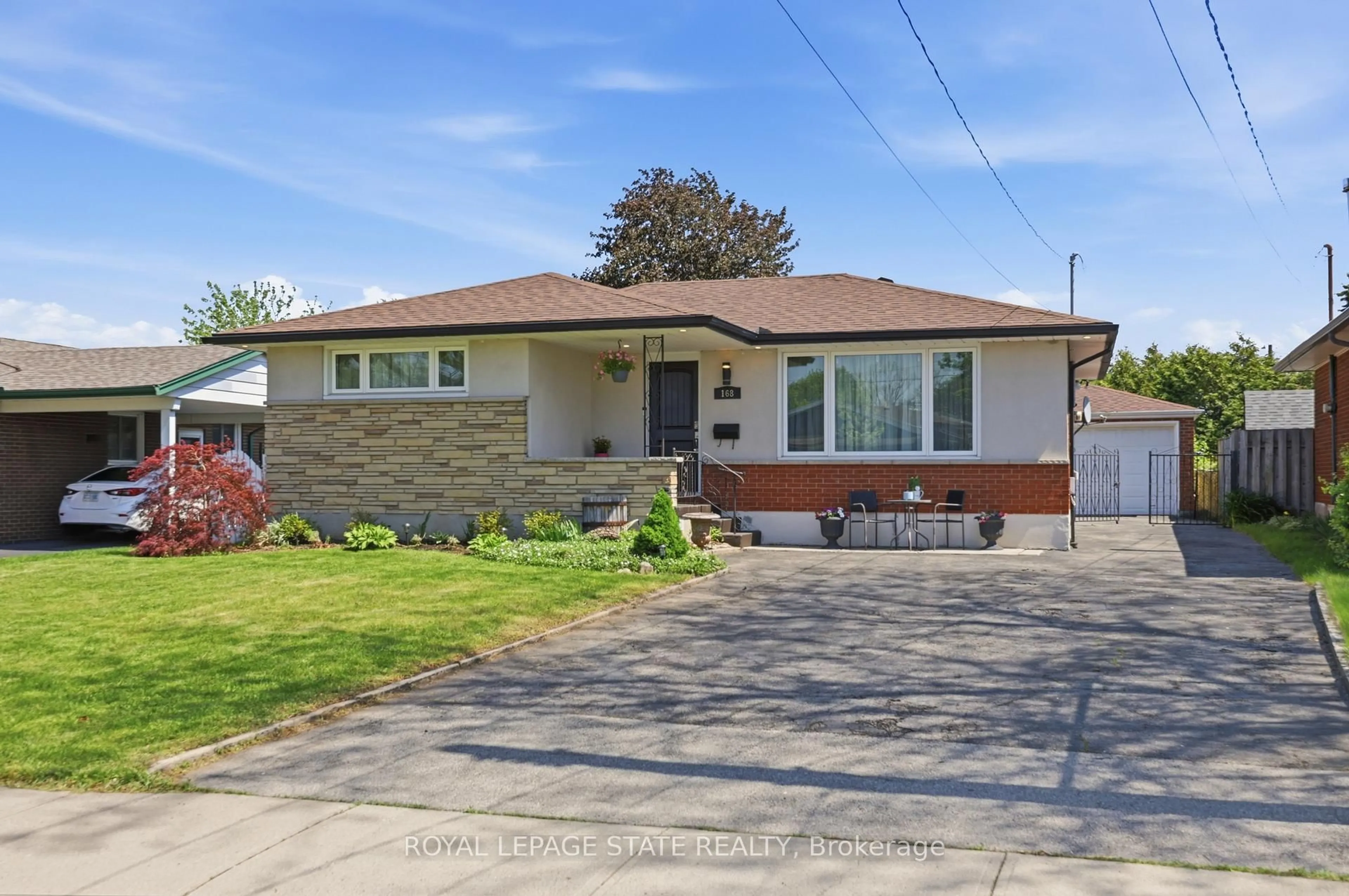 Home with brick exterior material, street for 168 Nugent Dr, Hamilton Ontario L8H 2N4