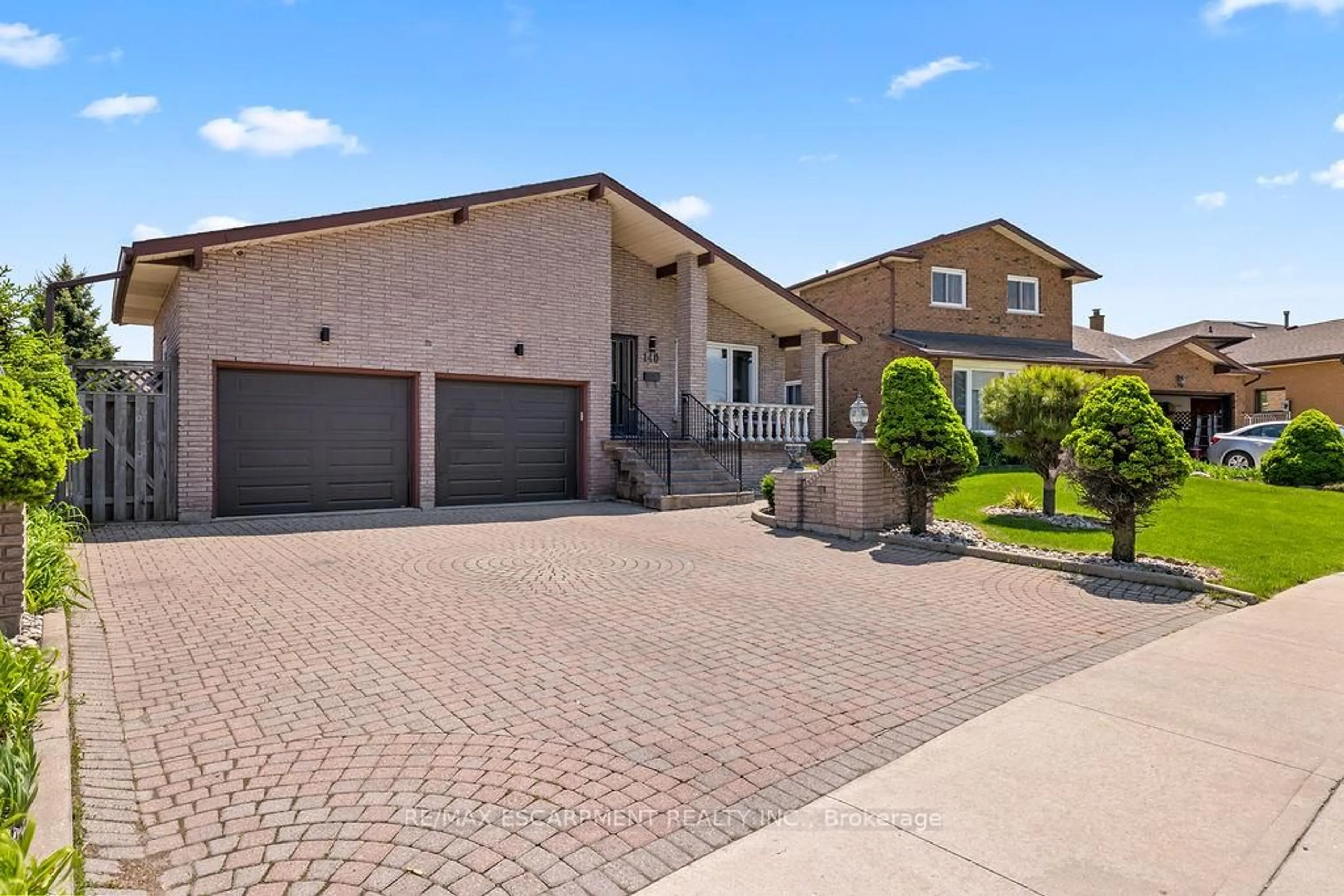 Home with brick exterior material, street for 140 Solomon Cres, Hamilton Ontario L8W 2G7