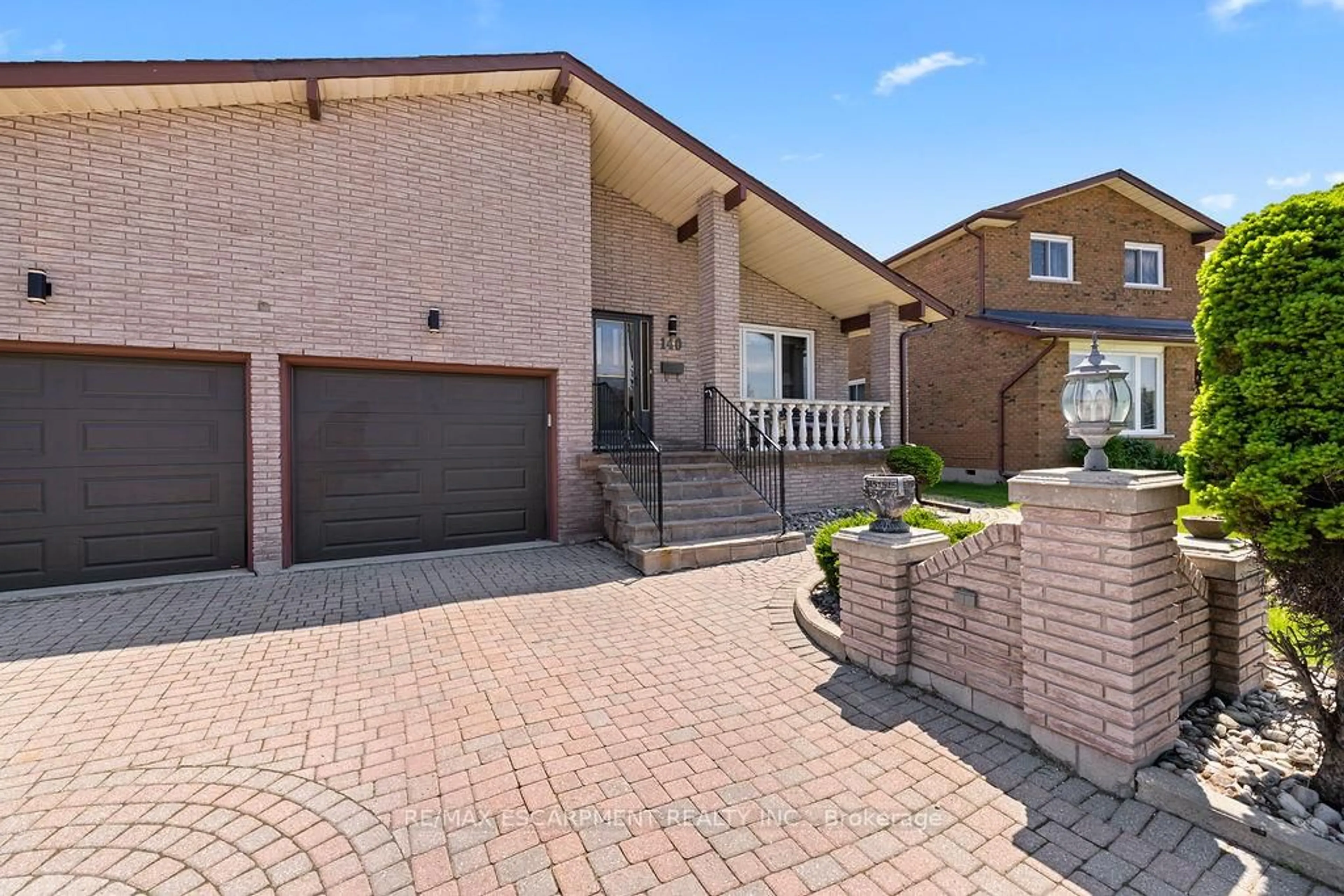 Home with brick exterior material, street for 140 Solomon Cres, Hamilton Ontario L8W 2G7
