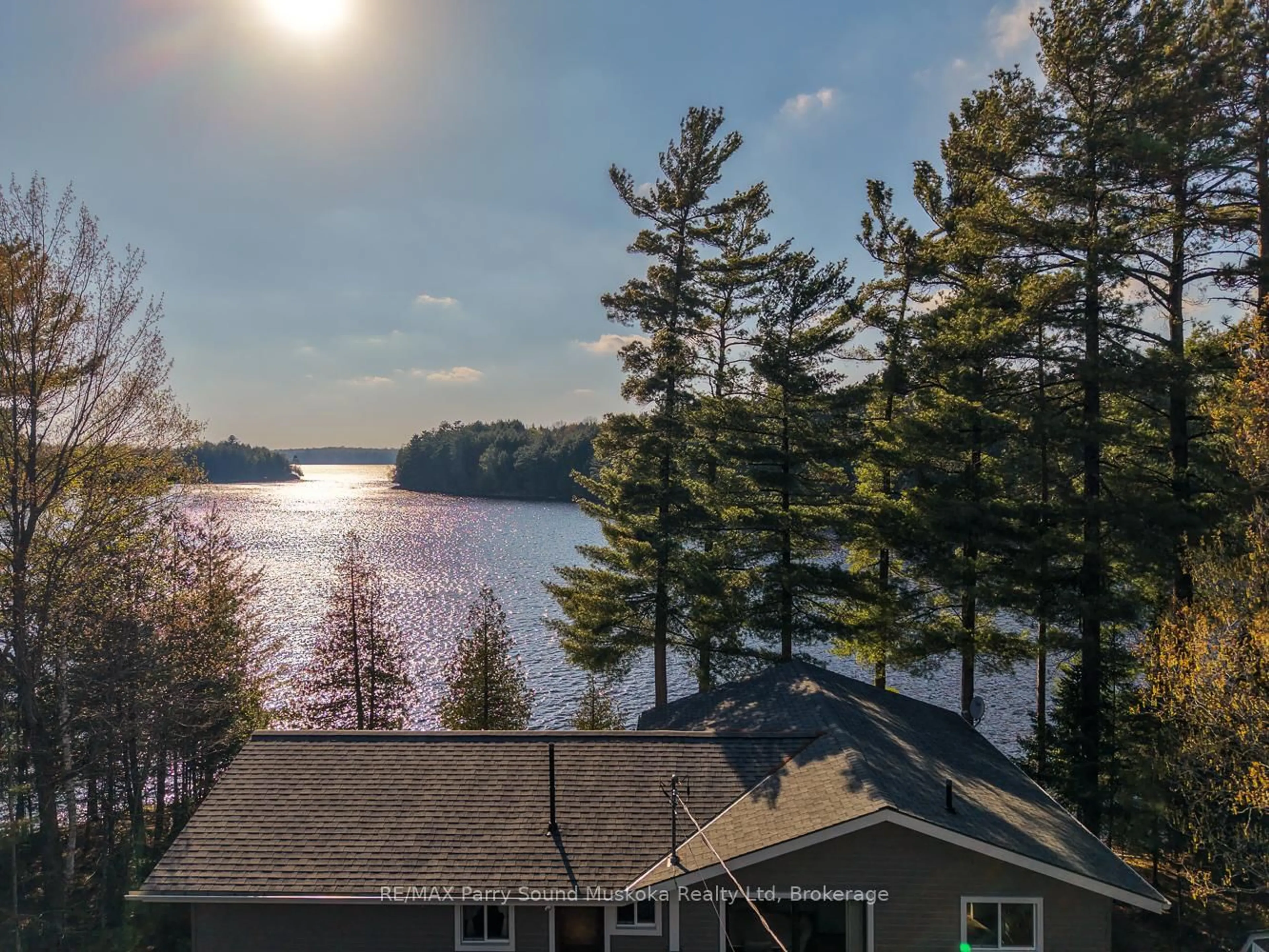 A pic from outside/outdoor area/front of a property/back of a property/a pic from drone, water/lake/river/ocean view for 37 Smithpine Cres, McKellar Ontario P2A 0B5