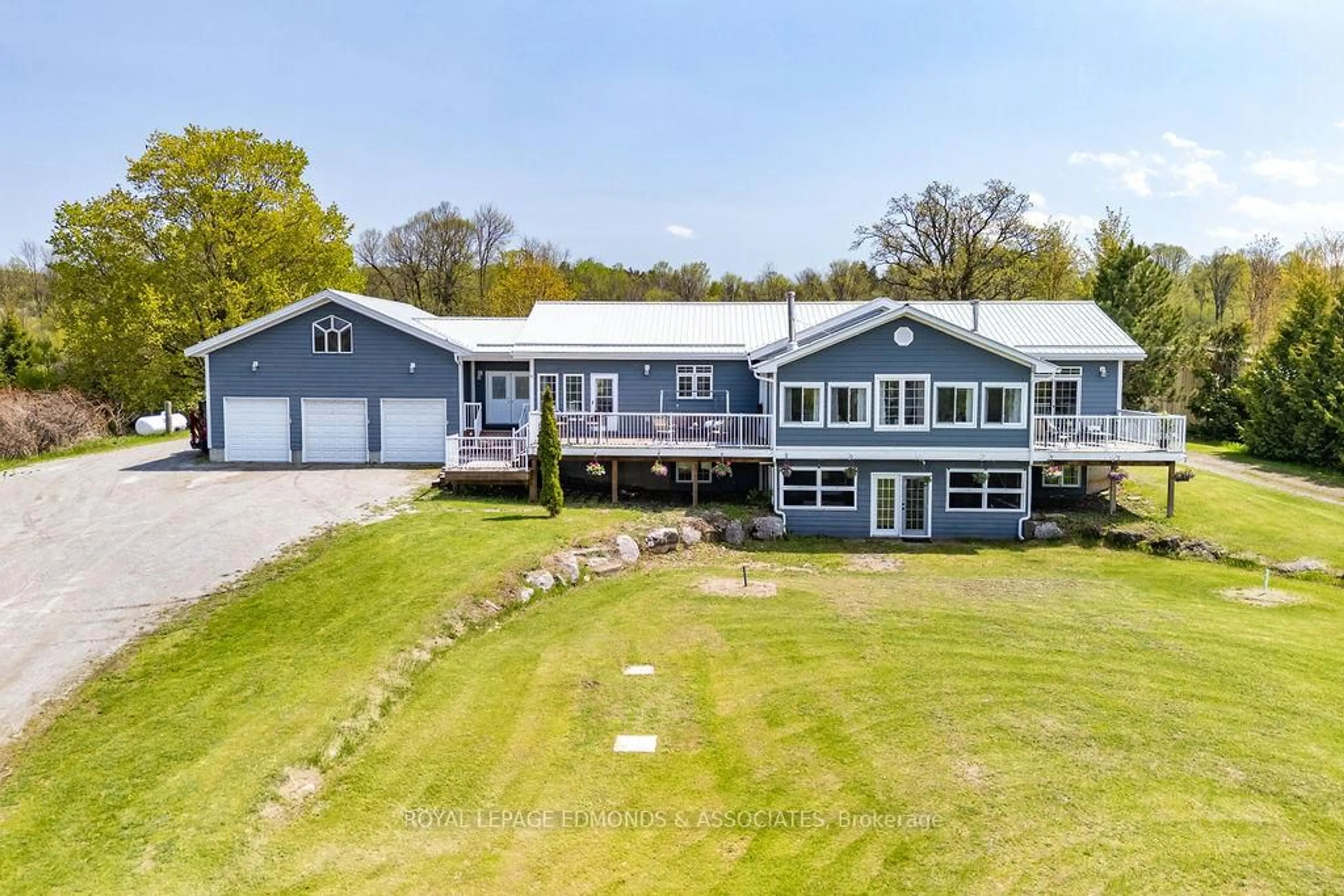 A pic from outside/outdoor area/front of a property/back of a property/a pic from drone, water/lake/river/ocean view for 700 Point Church Dr, Haliburton Ontario K0L 3C0