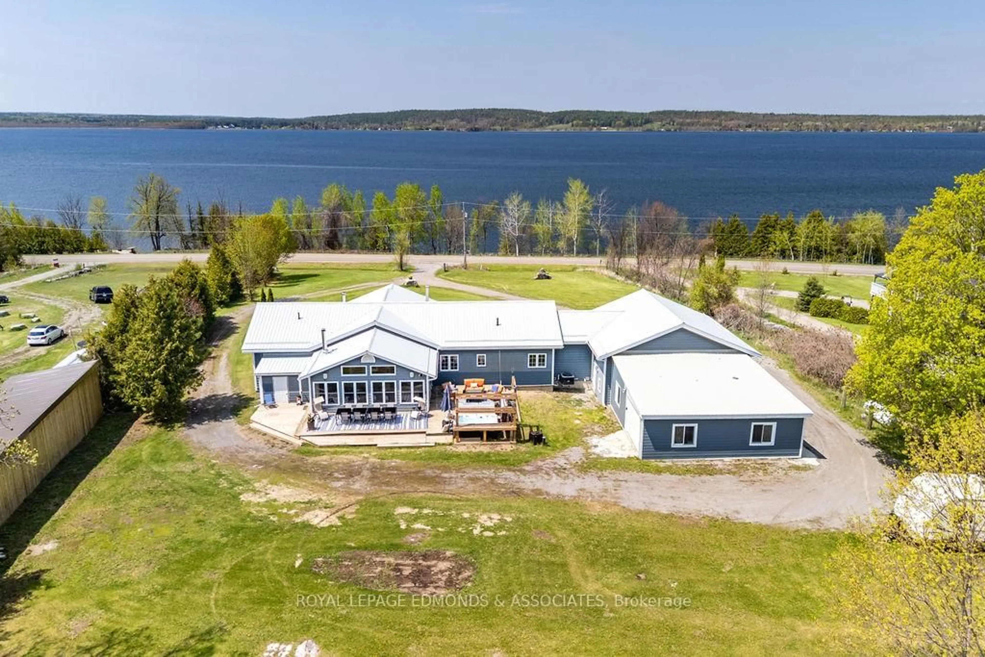 A pic from outside/outdoor area/front of a property/back of a property/a pic from drone, water/lake/river/ocean view for 700 Point Church Dr, Haliburton Ontario K0L 3C0